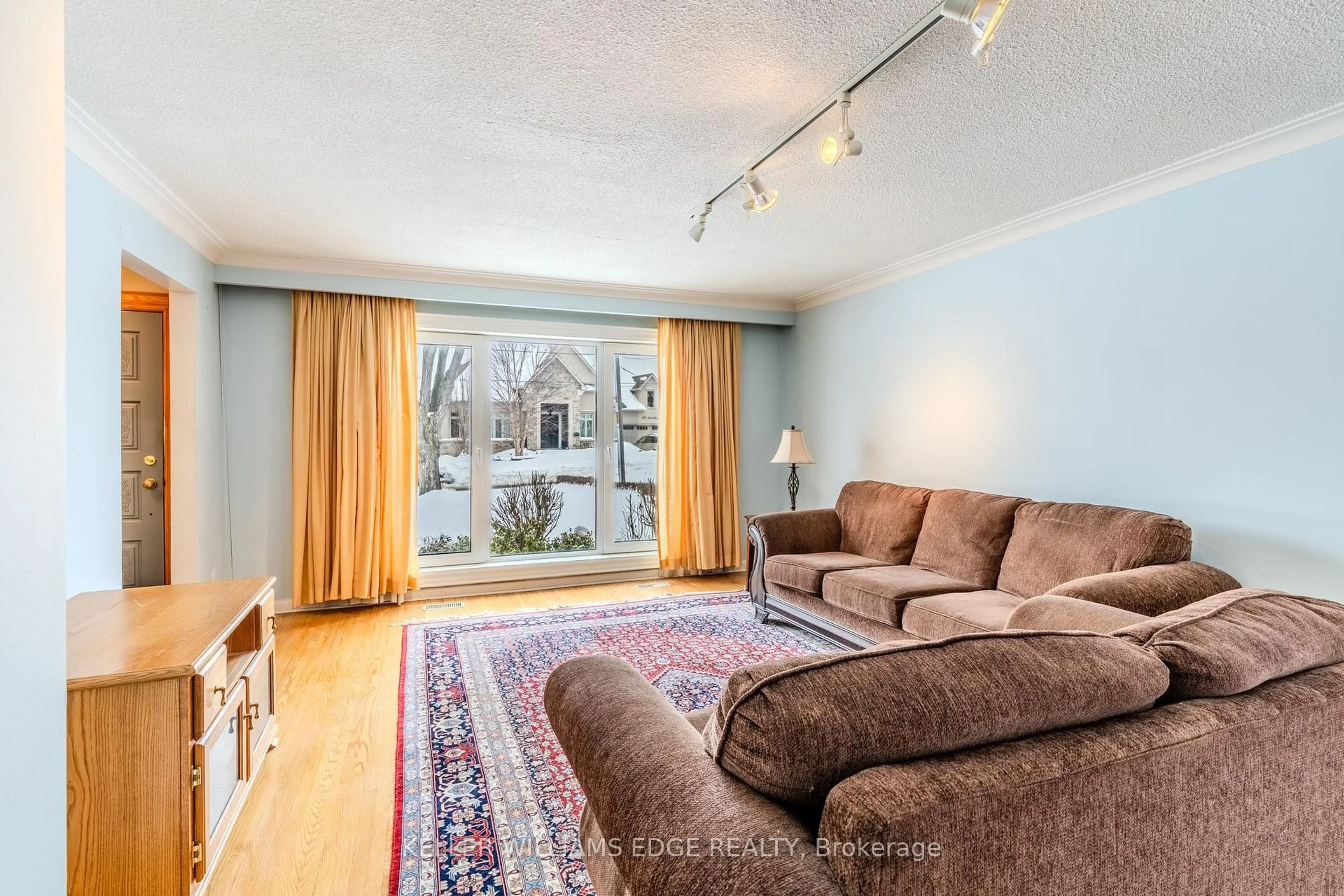 Living room with furniture, carpet floor for 57 Apted Ave, Toronto Ontario M9L 2P2