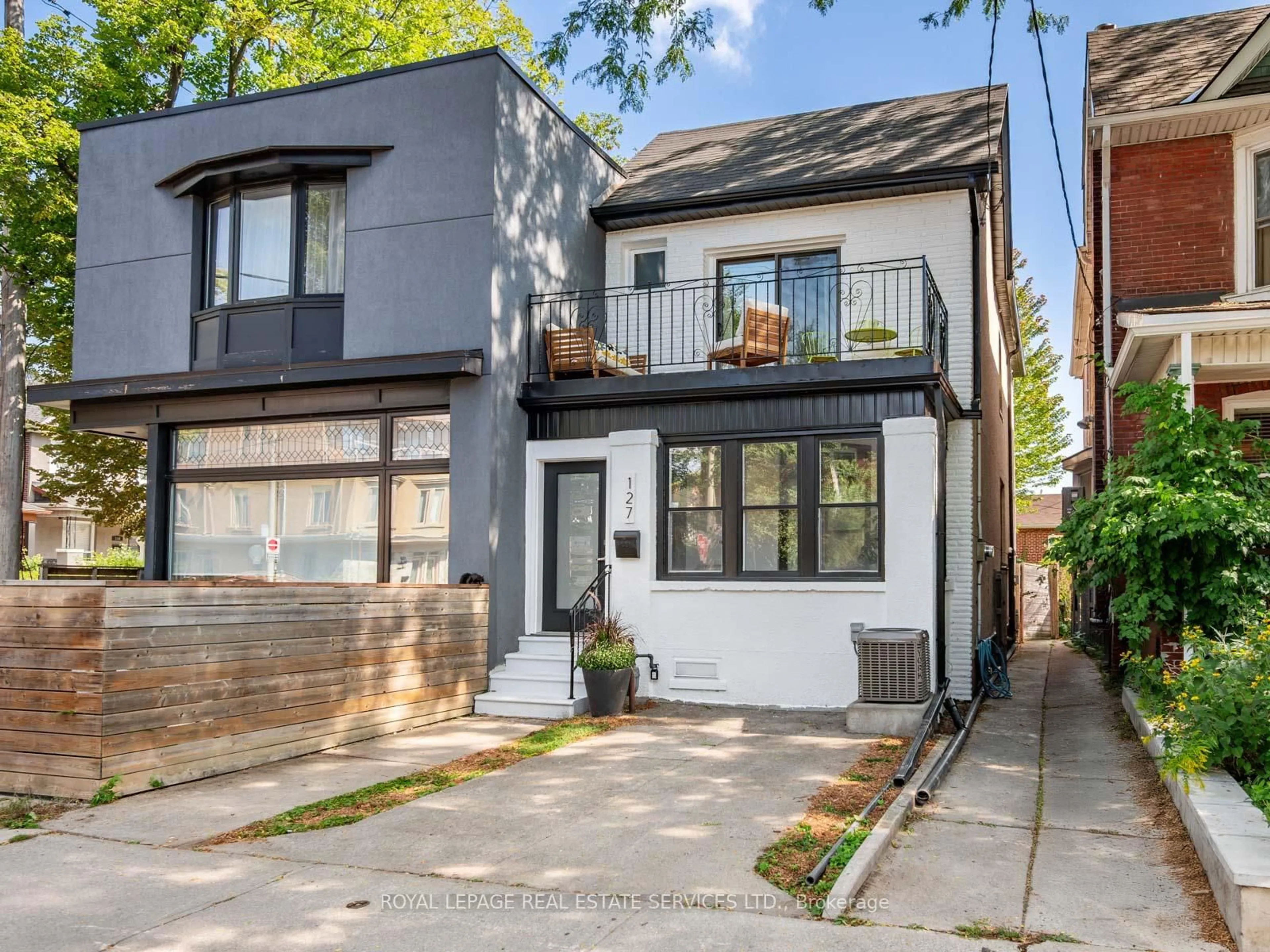 Home with brick exterior material, street for 127 Emerson Ave, Toronto Ontario M6H 3S7