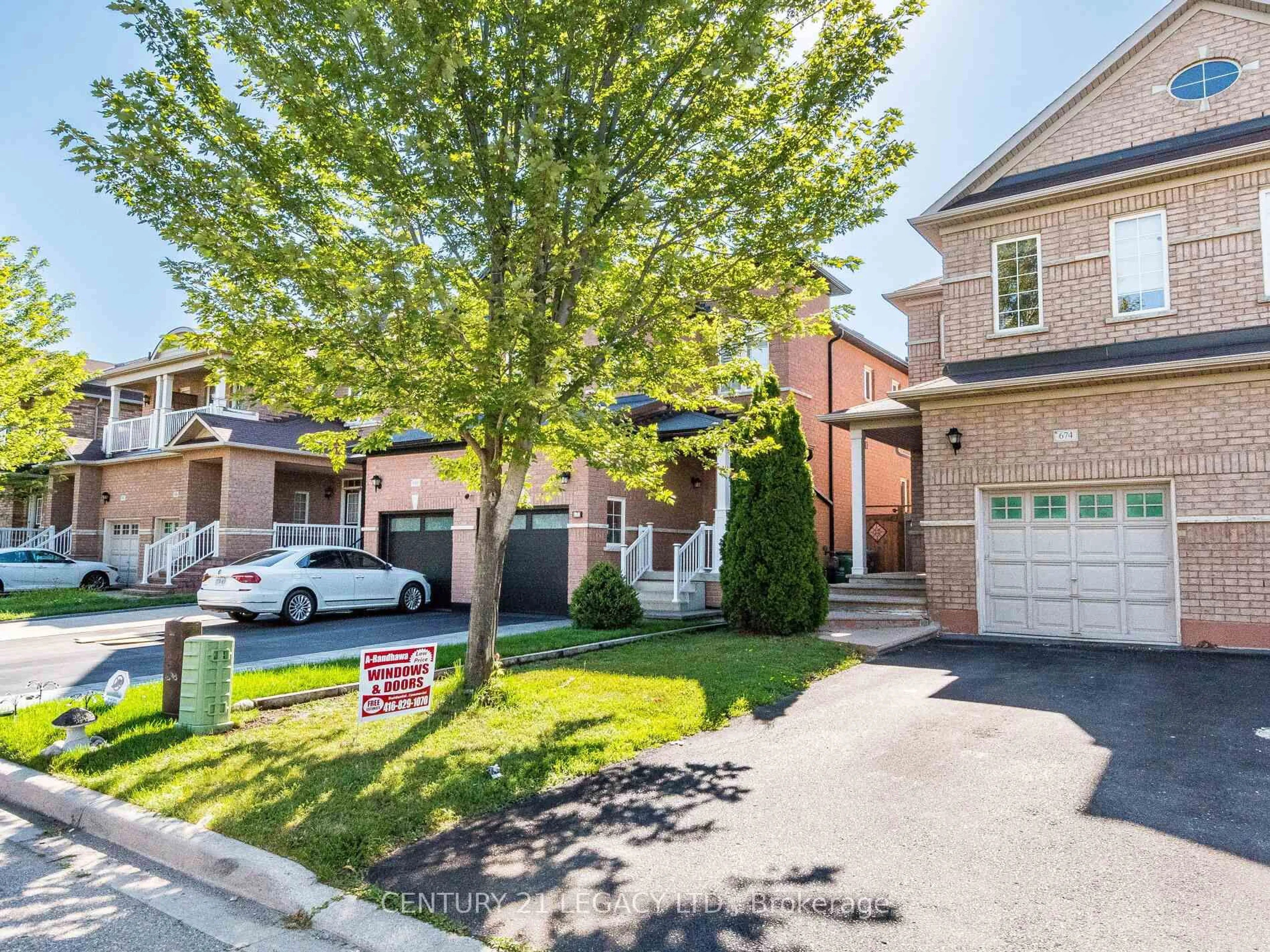 Home with brick exterior material, street for 674 Coach Dr, Mississauga Ontario L5R 0C6