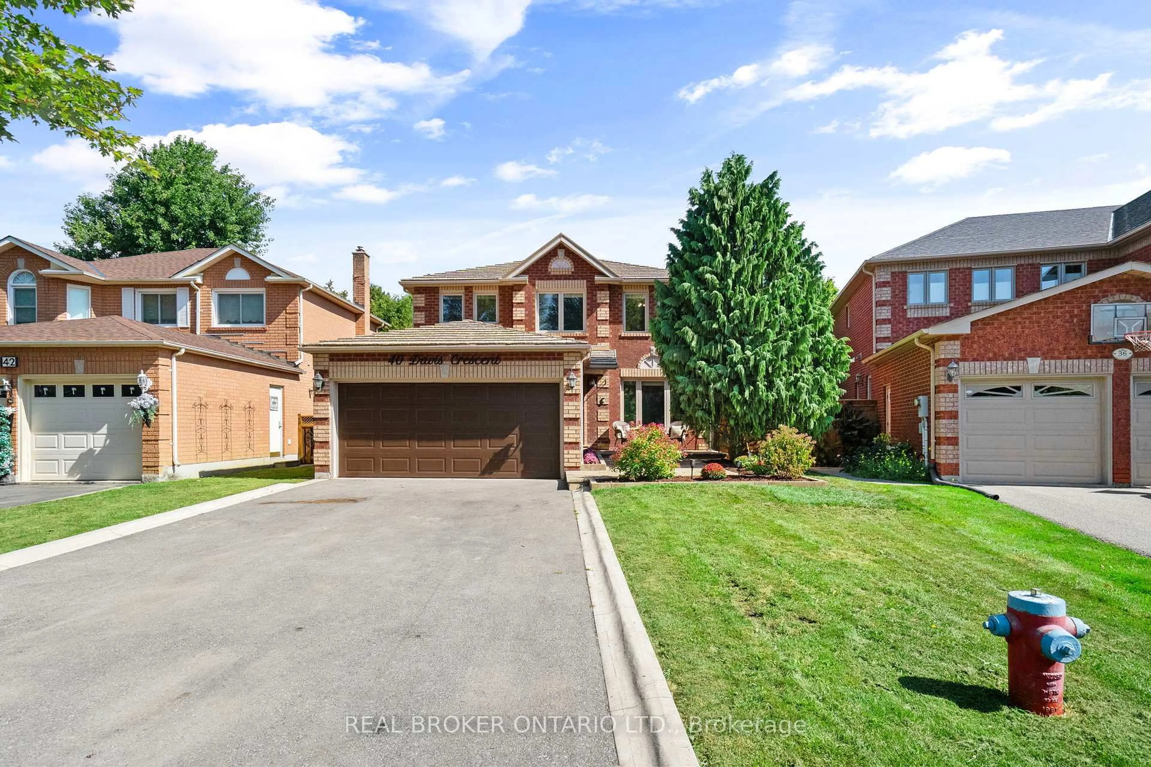 Home with brick exterior material, street for 40 Davis Cres, Halton Hills Ontario L7G 5P5