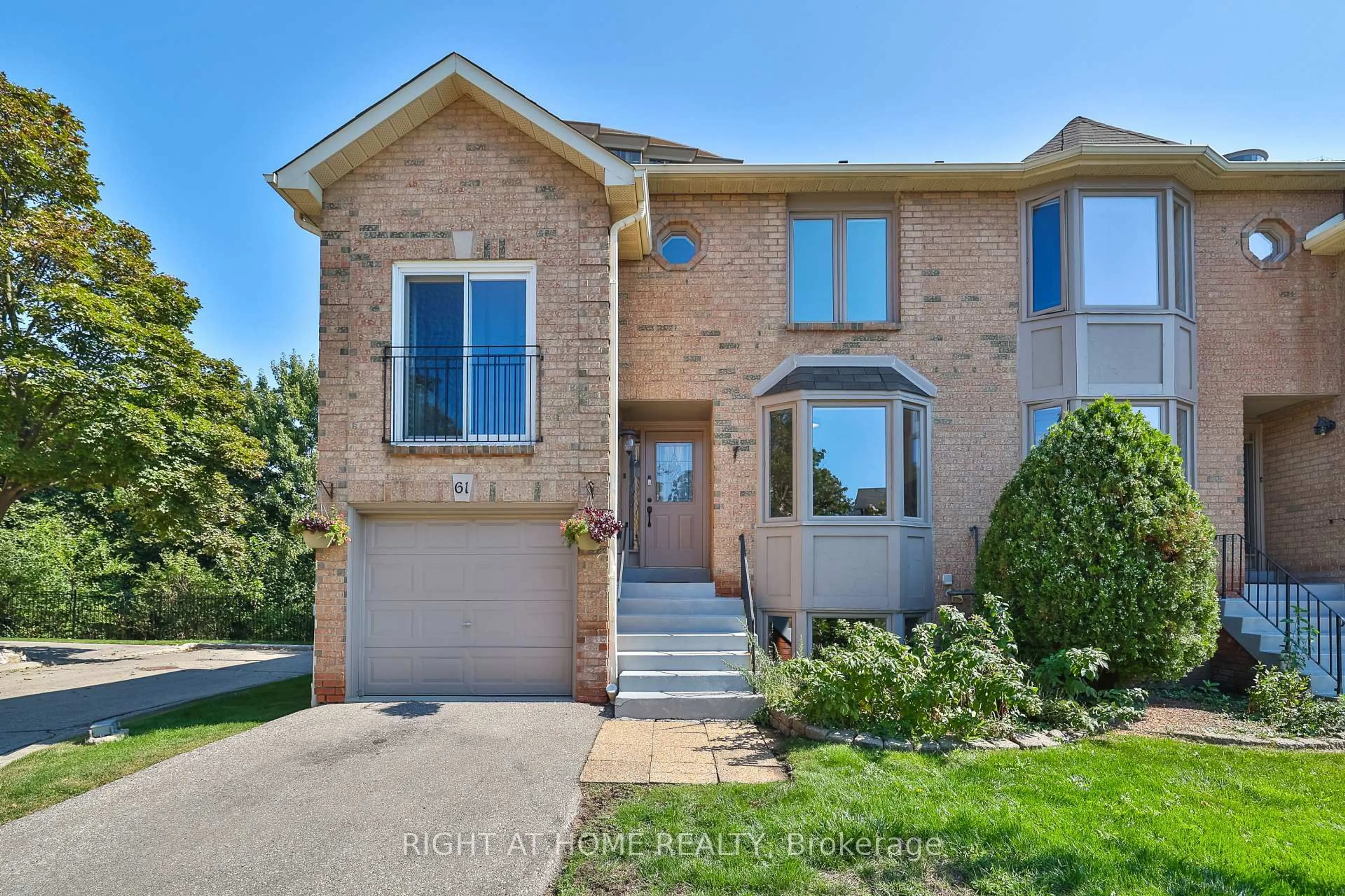 Home with brick exterior material, street for 4635 Regents Terr #61, Mississauga Ontario L5R 1W8