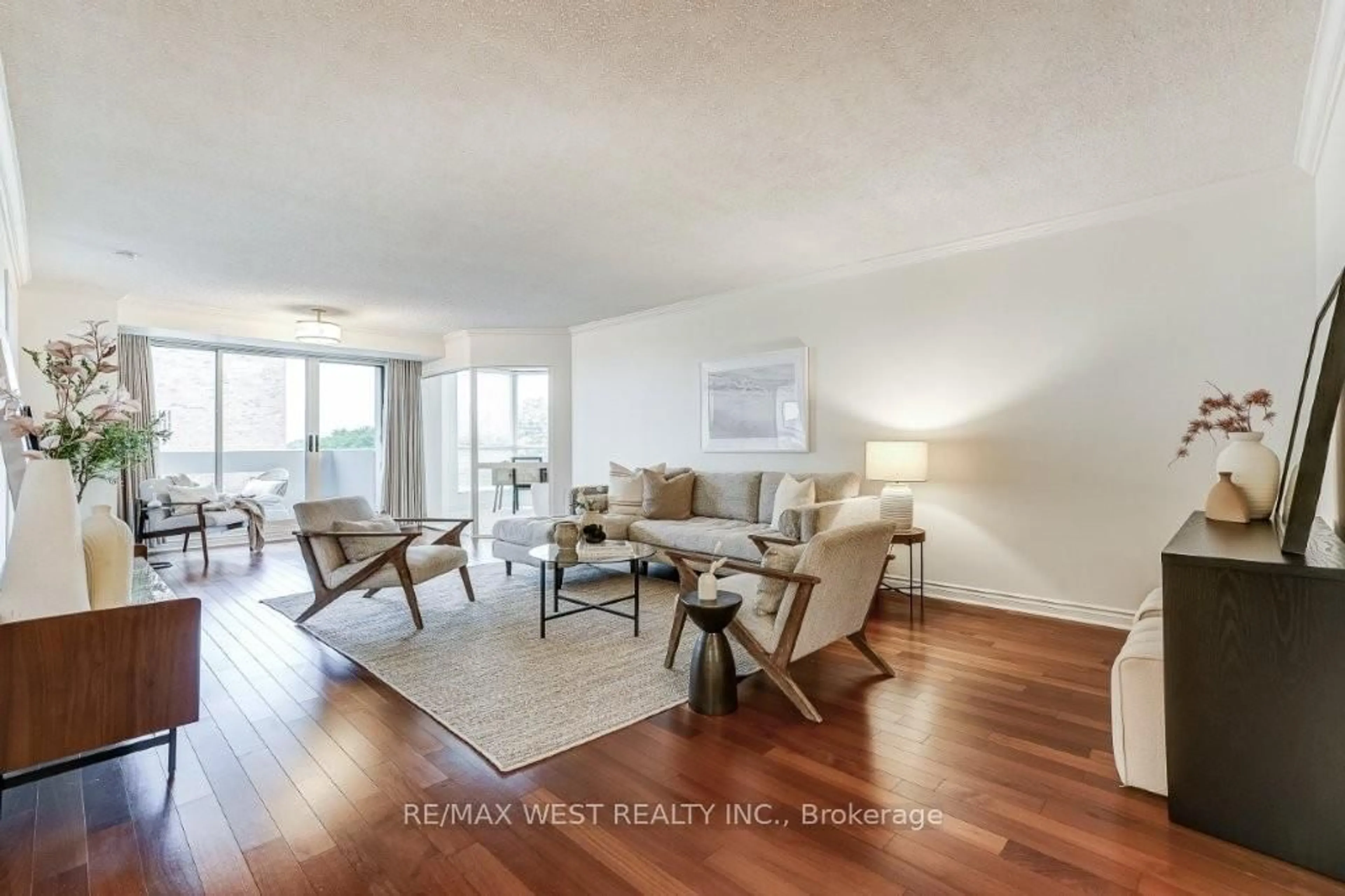 Living room with furniture, wood/laminate floor for 1237 North Shore Blvd #707, Burlington Ontario L7S 2H8