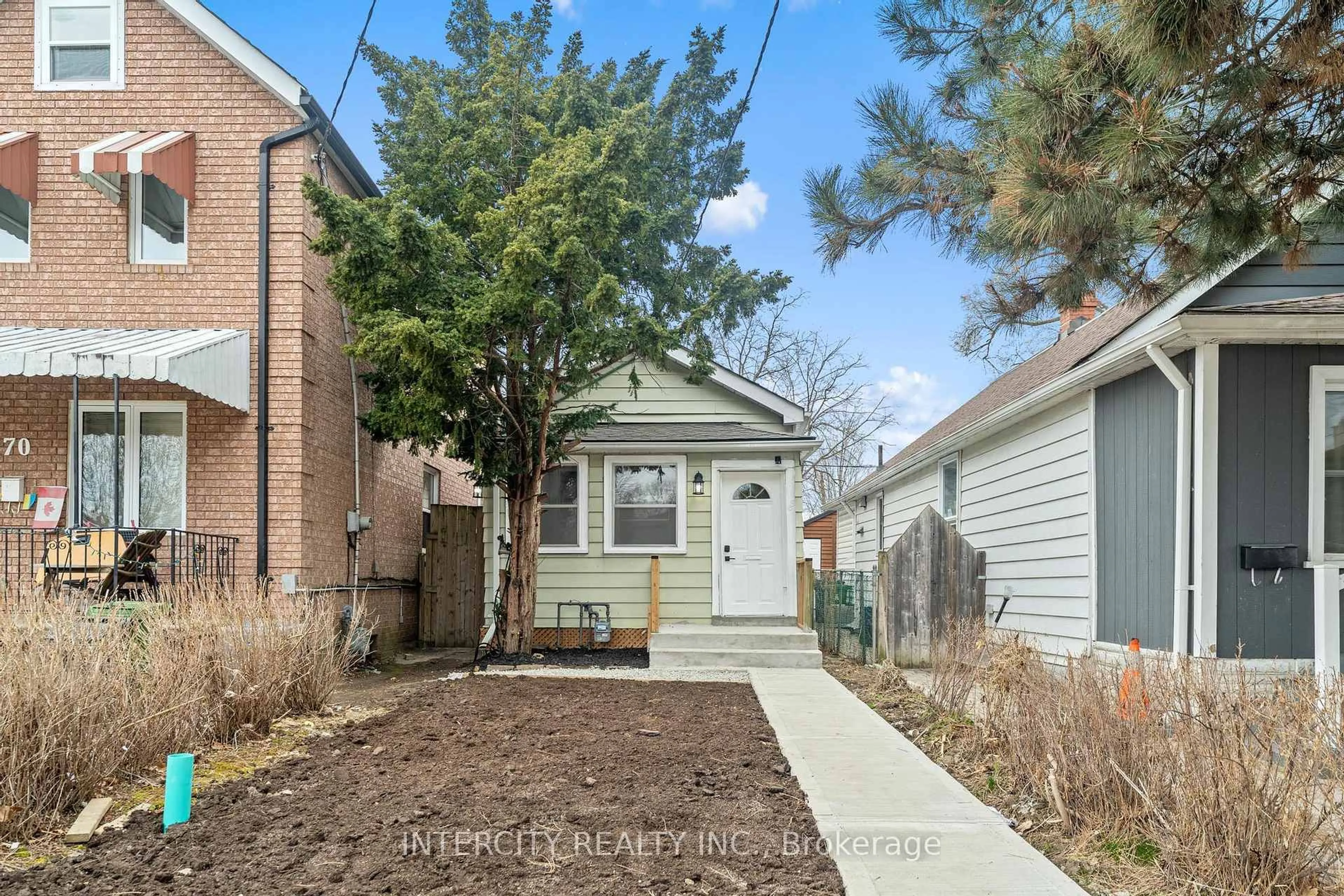 Home with brick exterior material, street for 68 Greendale Ave, Toronto Ontario M6N 4P6