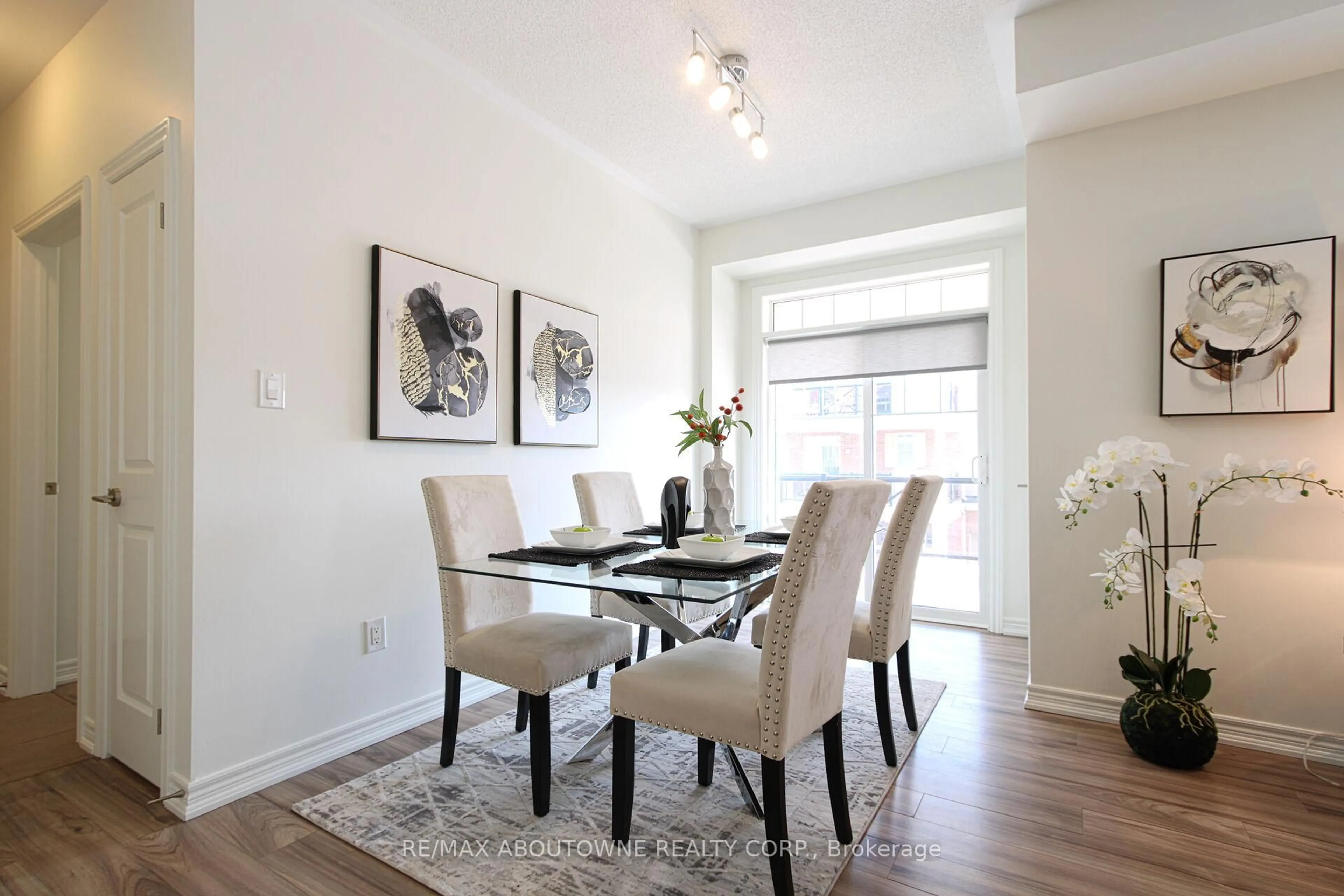 Dining room, wood/laminate floor for 2339 Sawgrass Dr #206, Oakville Ontario L6H 0L1