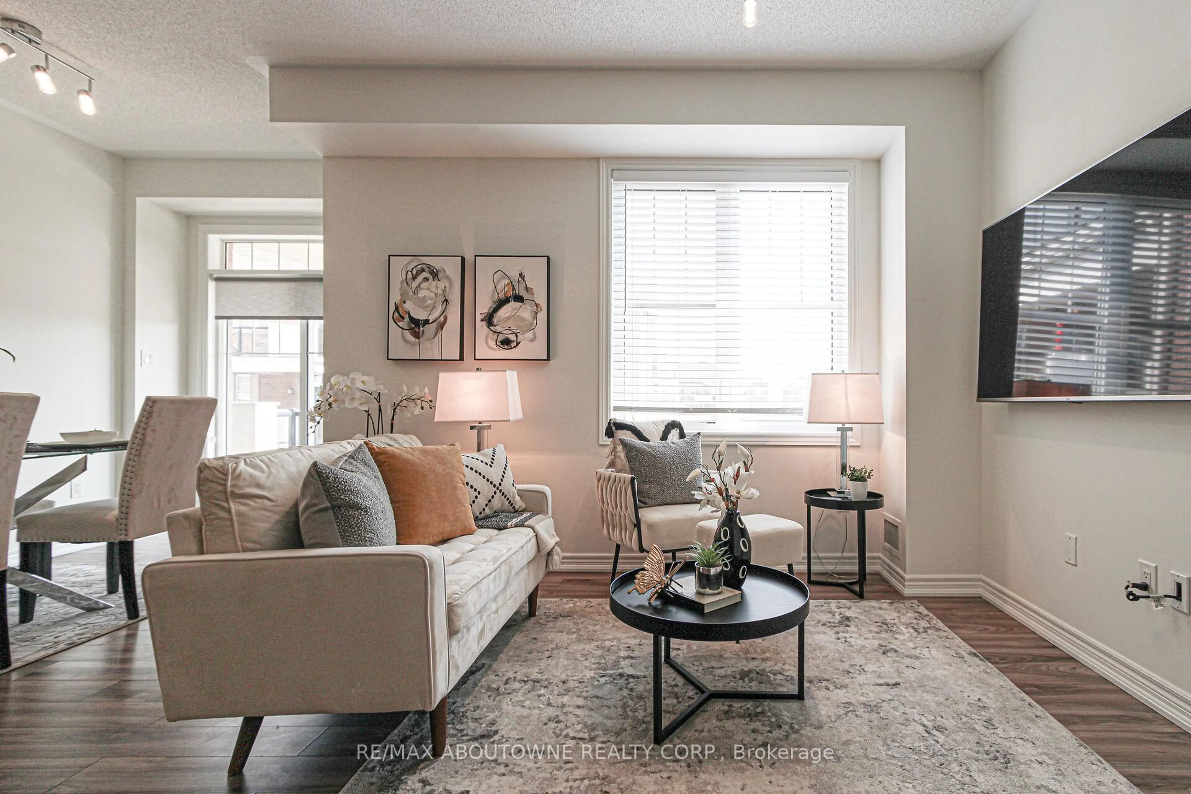 Living room with furniture, unknown for 2339 Sawgrass Dr #206, Oakville Ontario L6H 0L1