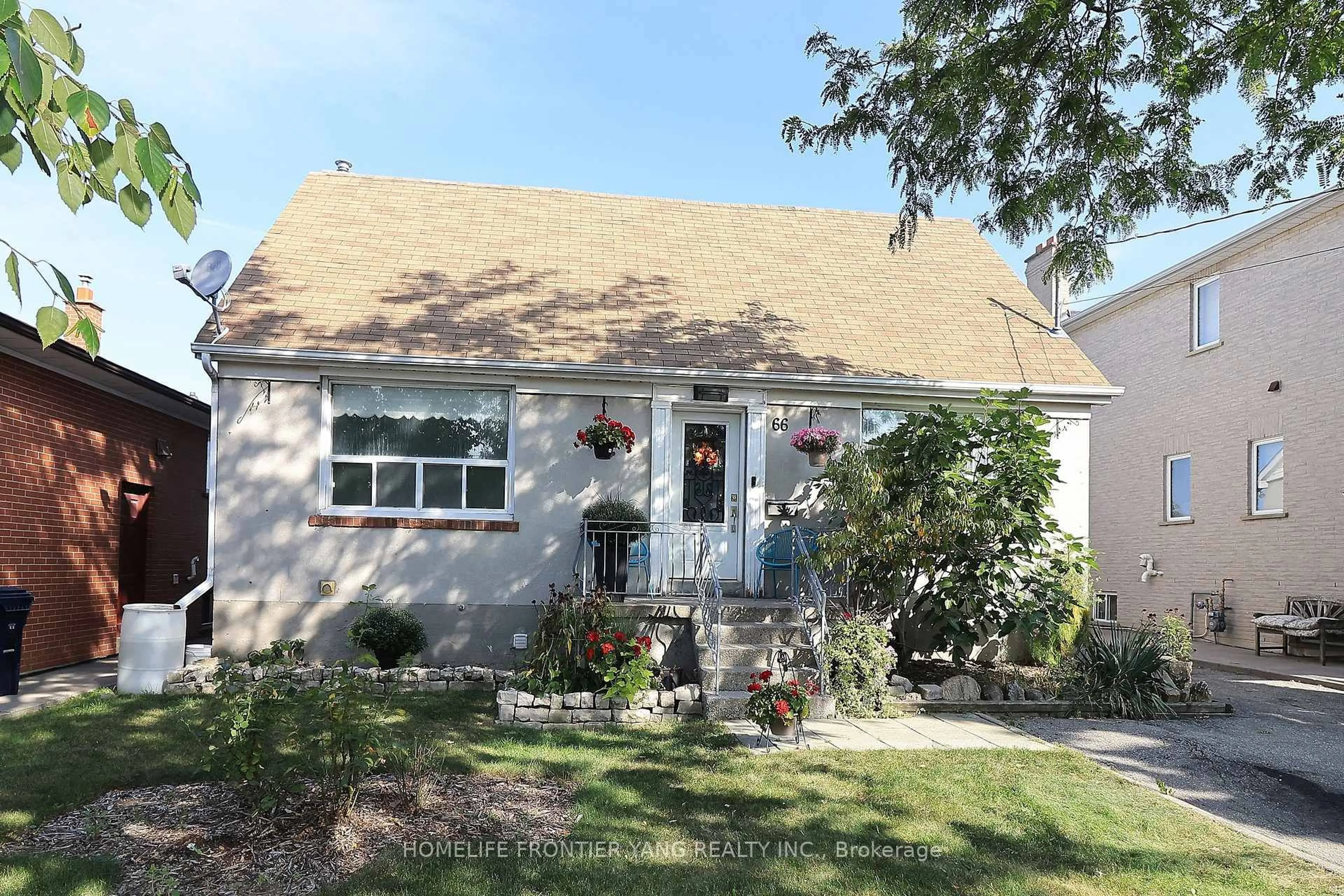 Home with vinyl exterior material, street for 66 Cartwright Ave, Toronto Ontario M6A 1T9