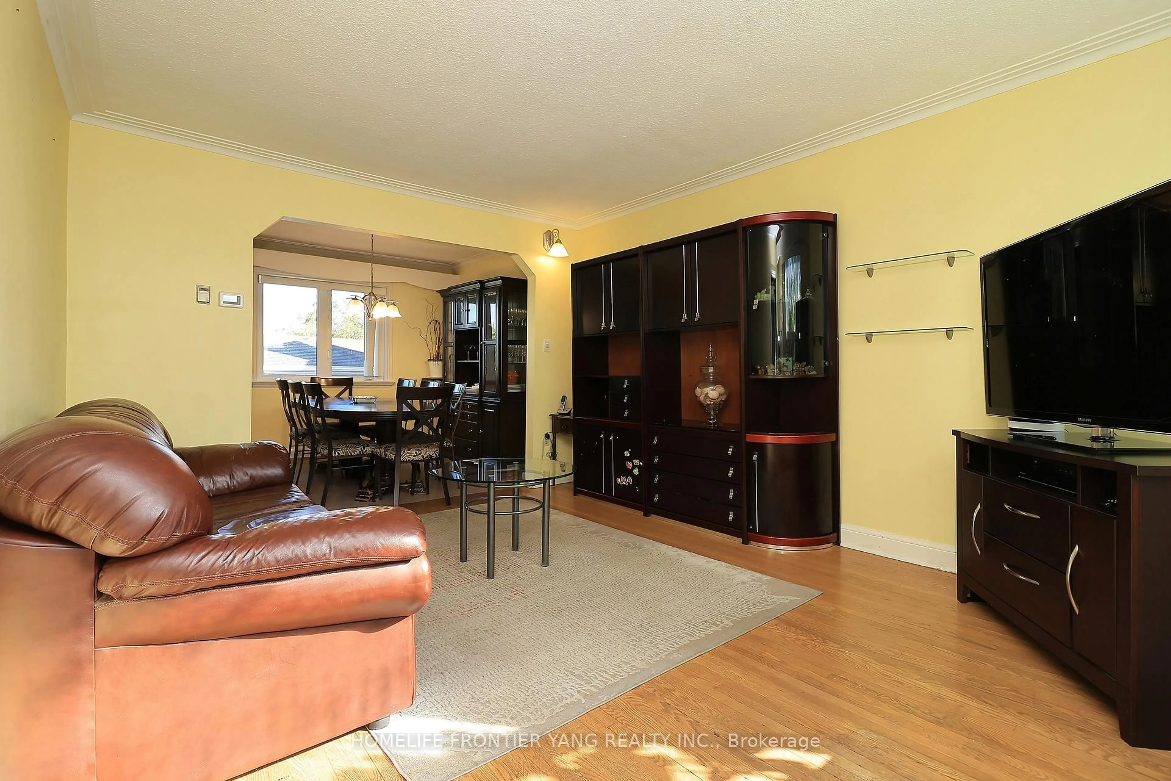 Living room with furniture, unknown for 66 Cartwright Ave, Toronto Ontario M6A 1T9