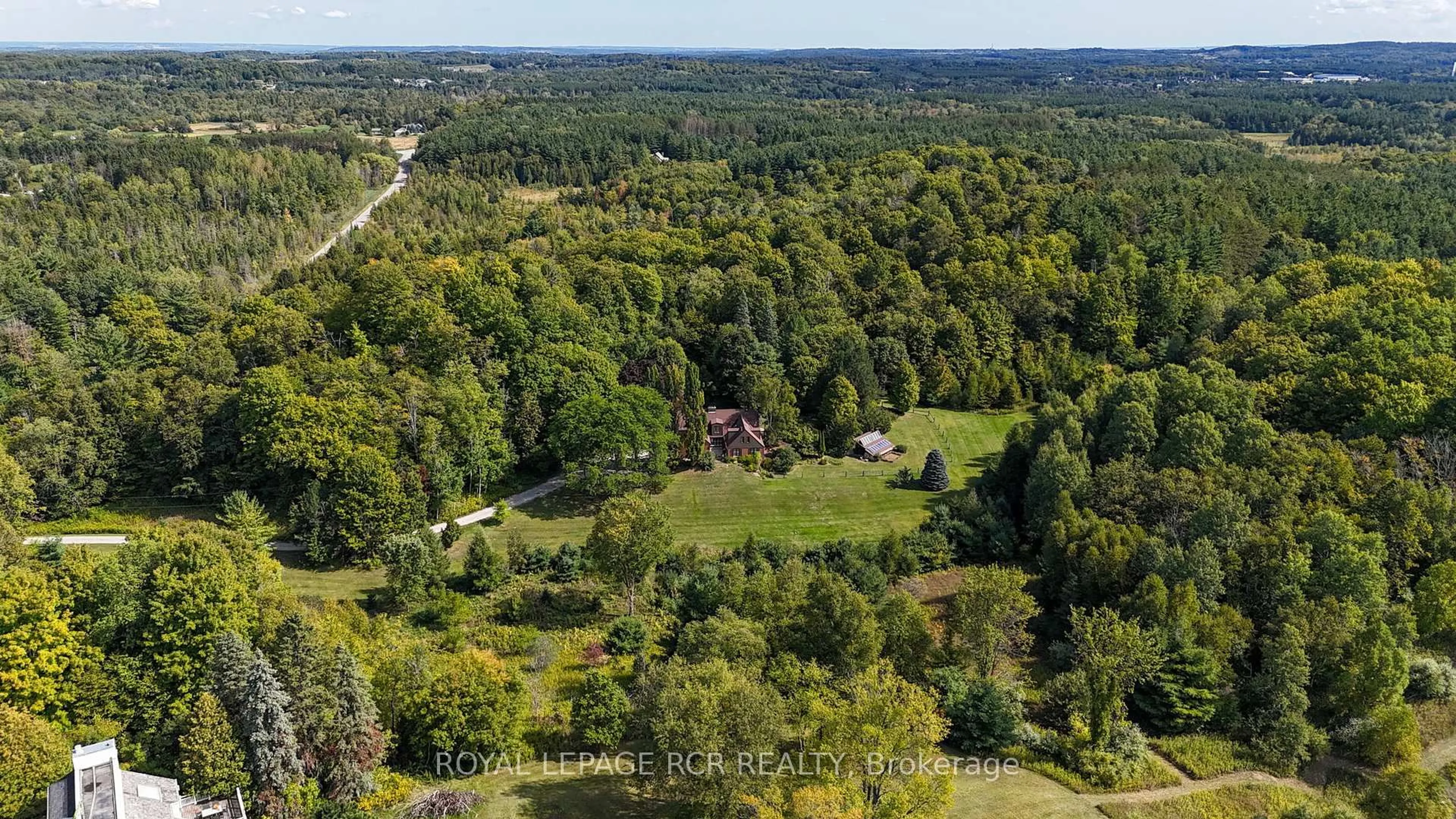A pic from outside/outdoor area/front of a property/back of a property/a pic from drone, forest/trees view for 8225 Finnerty Sdrd, Caledon Ontario L7E 0H6