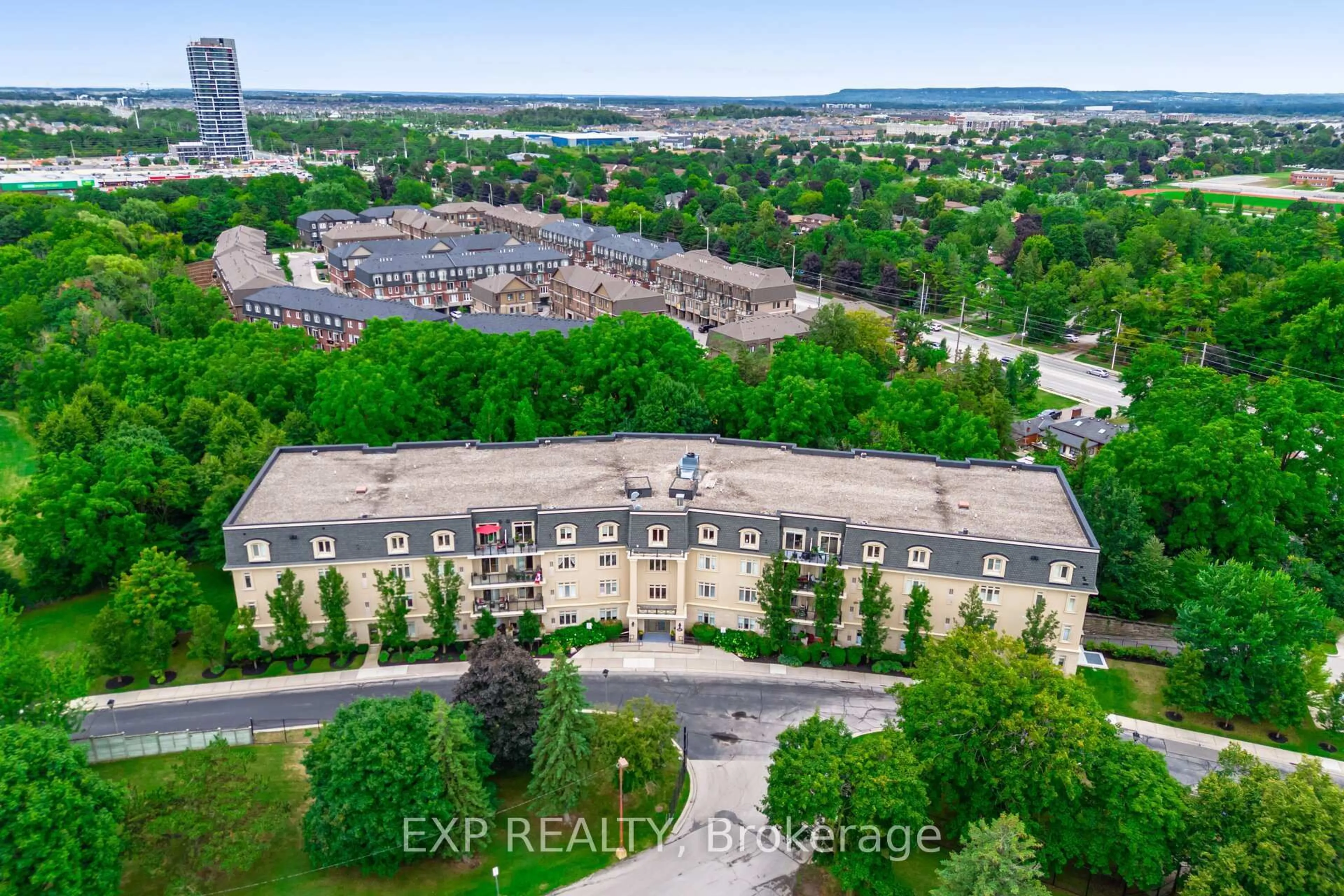 A pic from outside/outdoor area/front of a property/back of a property/a pic from drone, city buildings view from balcony for 443 Centennial Forest Dr #408, Milton Ontario L9T 6A1