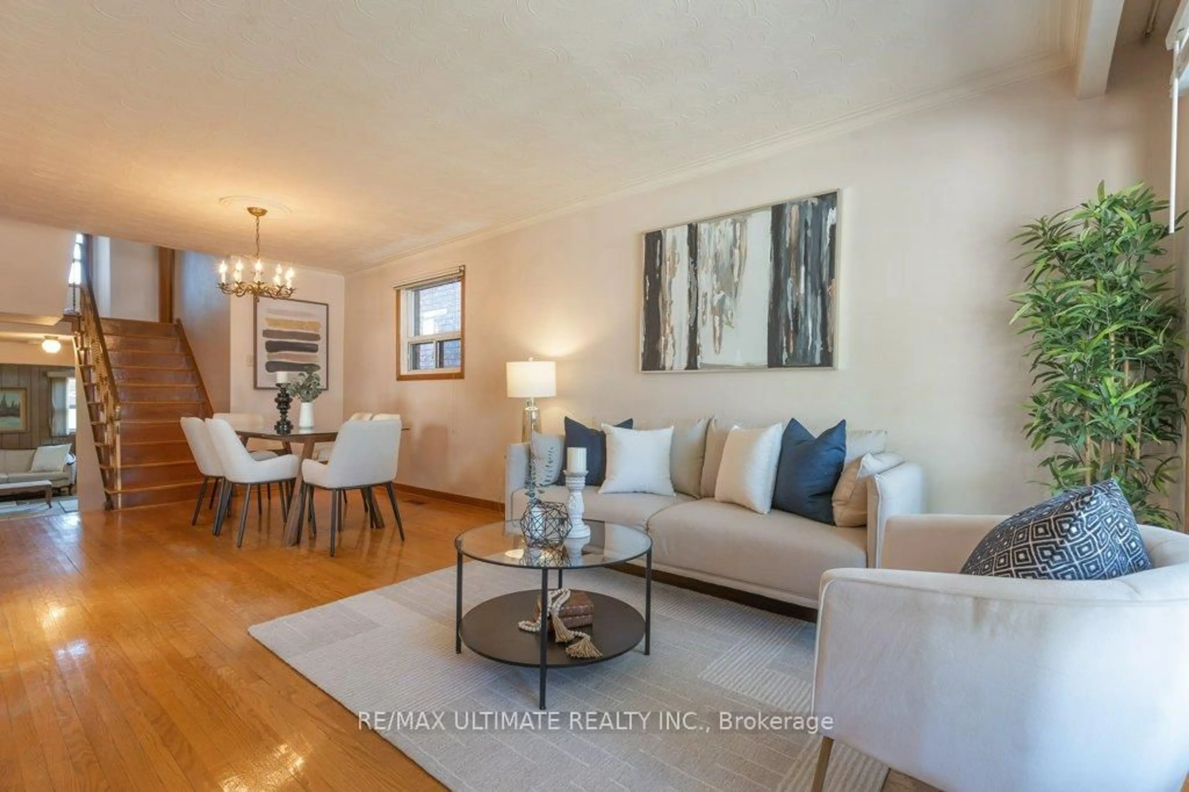 Living room with furniture, wood/laminate floor for 173 Aileen Ave, Toronto Ontario M6M 1G1