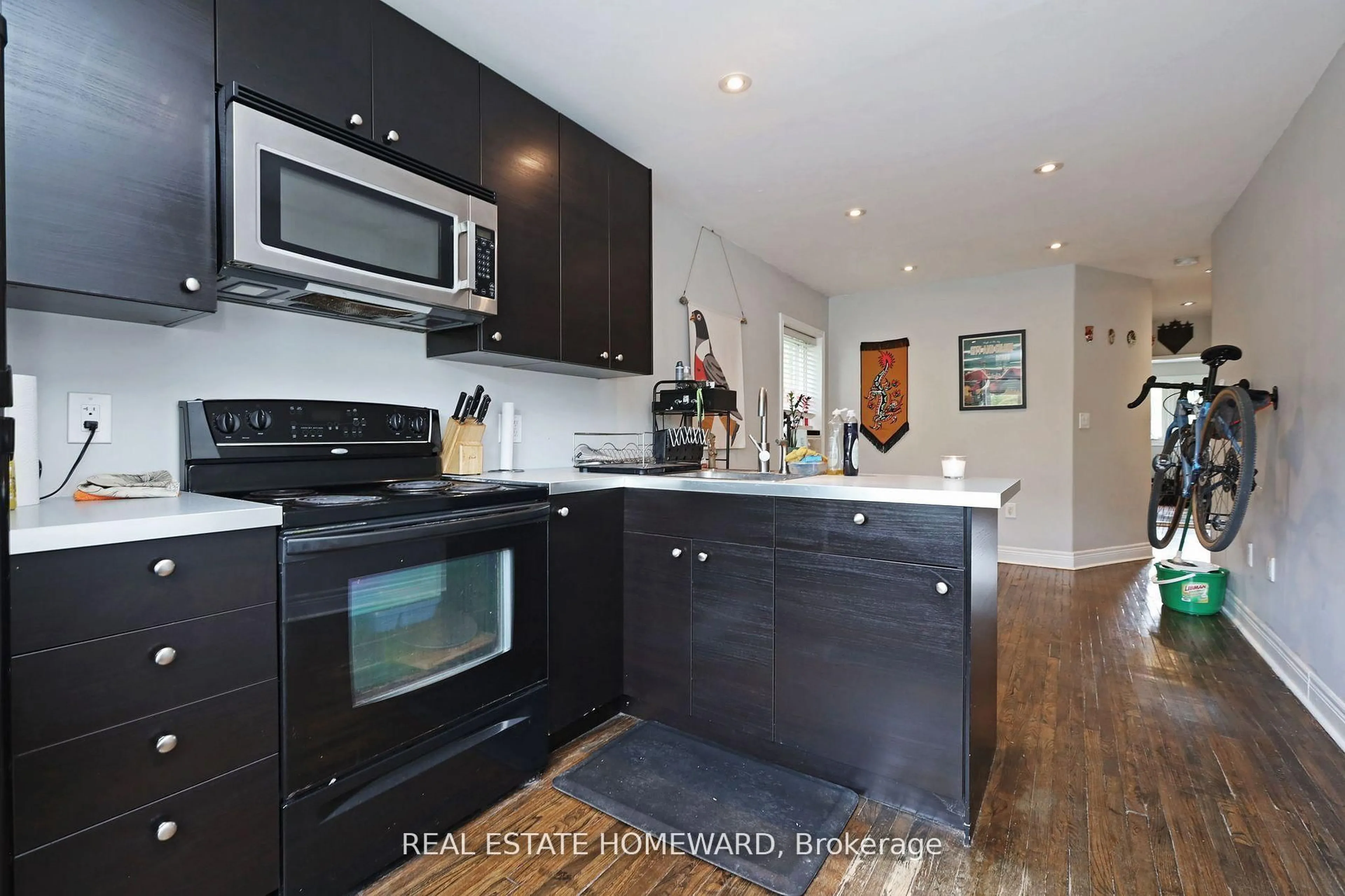 Open concept kitchen, wood/laminate floor for 156 Royal York Rd, Toronto Ontario M8V 2V3
