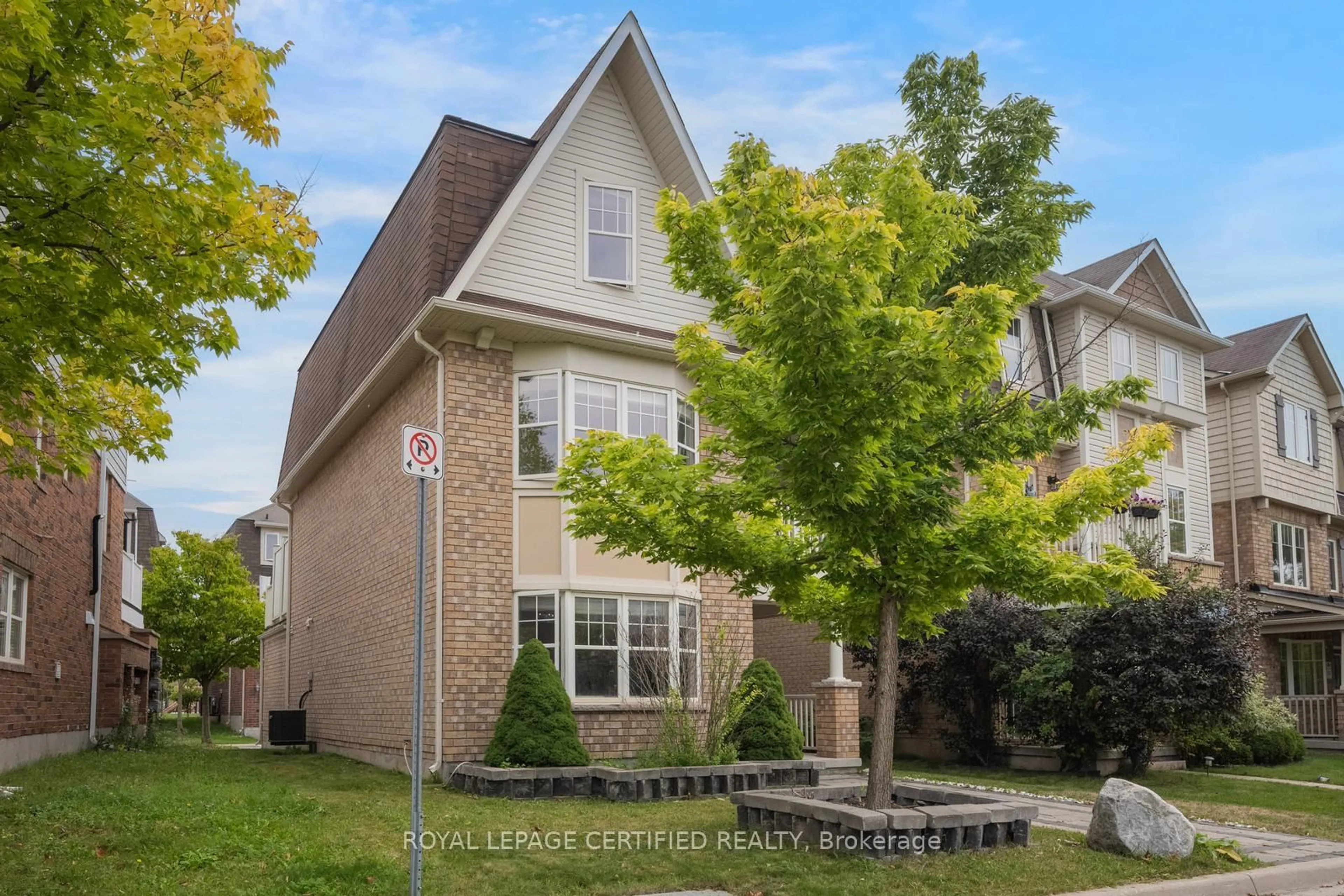 Home with brick exterior material, street for 216 Magurn Gate, Milton Ontario L9T 7B4