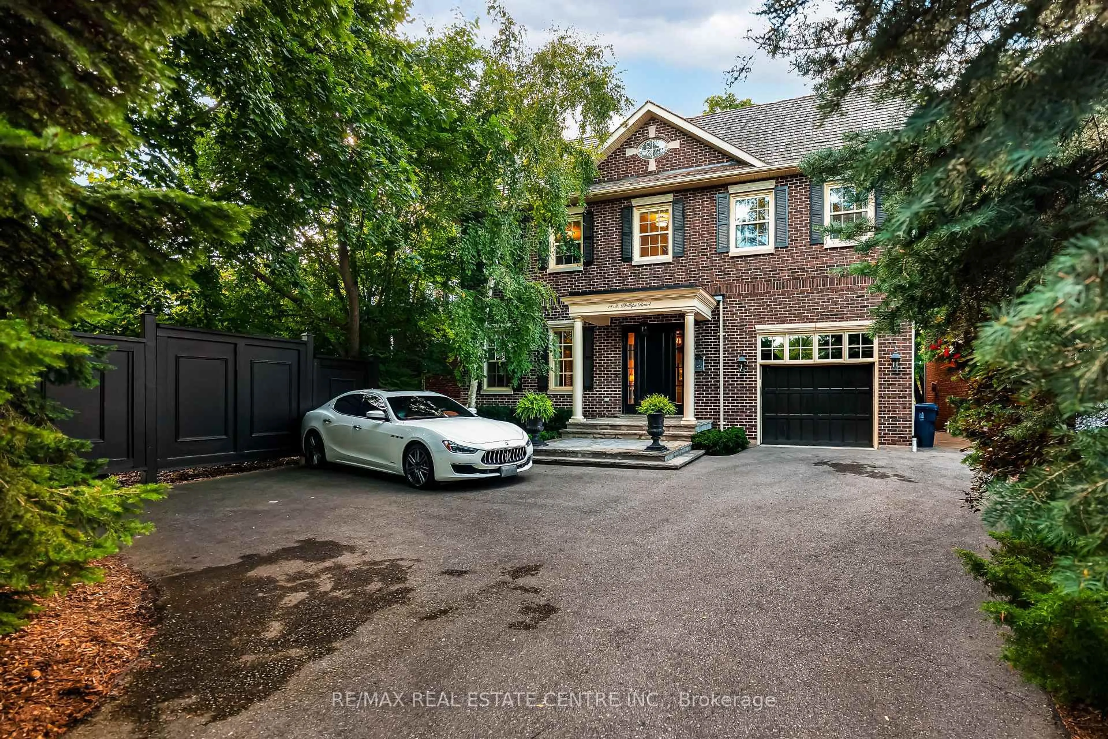 Home with brick exterior material, street for 14 St. Phillips Rd, Toronto Ontario M9P 2N6