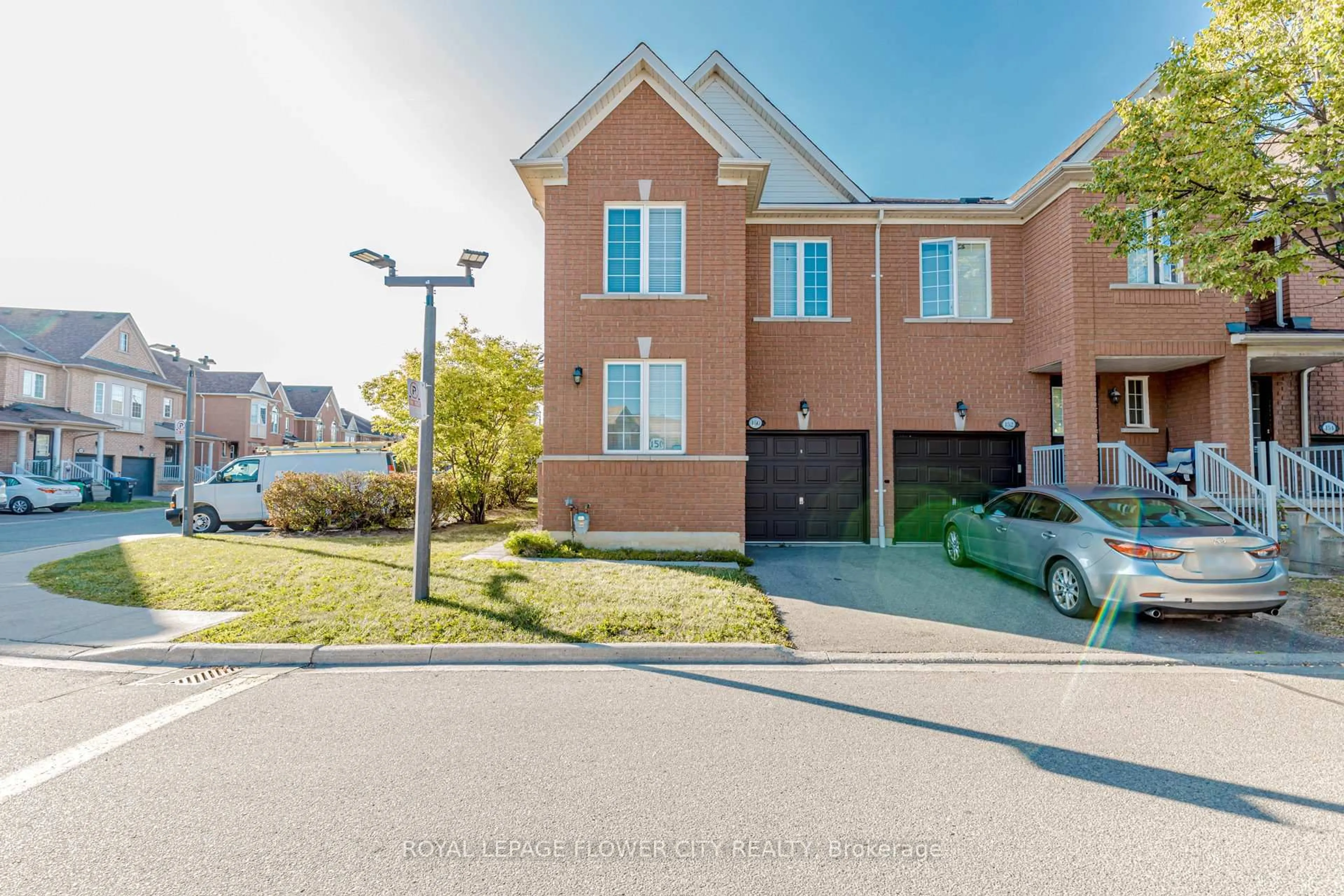 A pic from outside/outdoor area/front of a property/back of a property/a pic from drone, street for 525 Novo Star Dr #150, Mississauga Ontario L5W 1X9