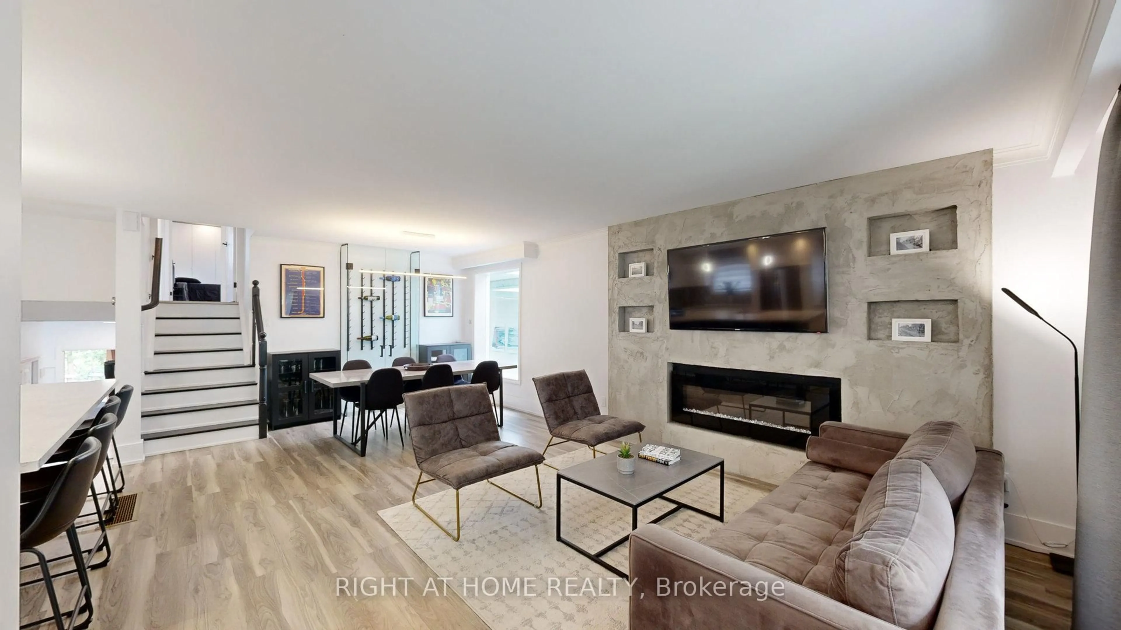 Living room with furniture, wood/laminate floor for 1492 Agnew Rd, Mississauga Ontario L5J 3G9