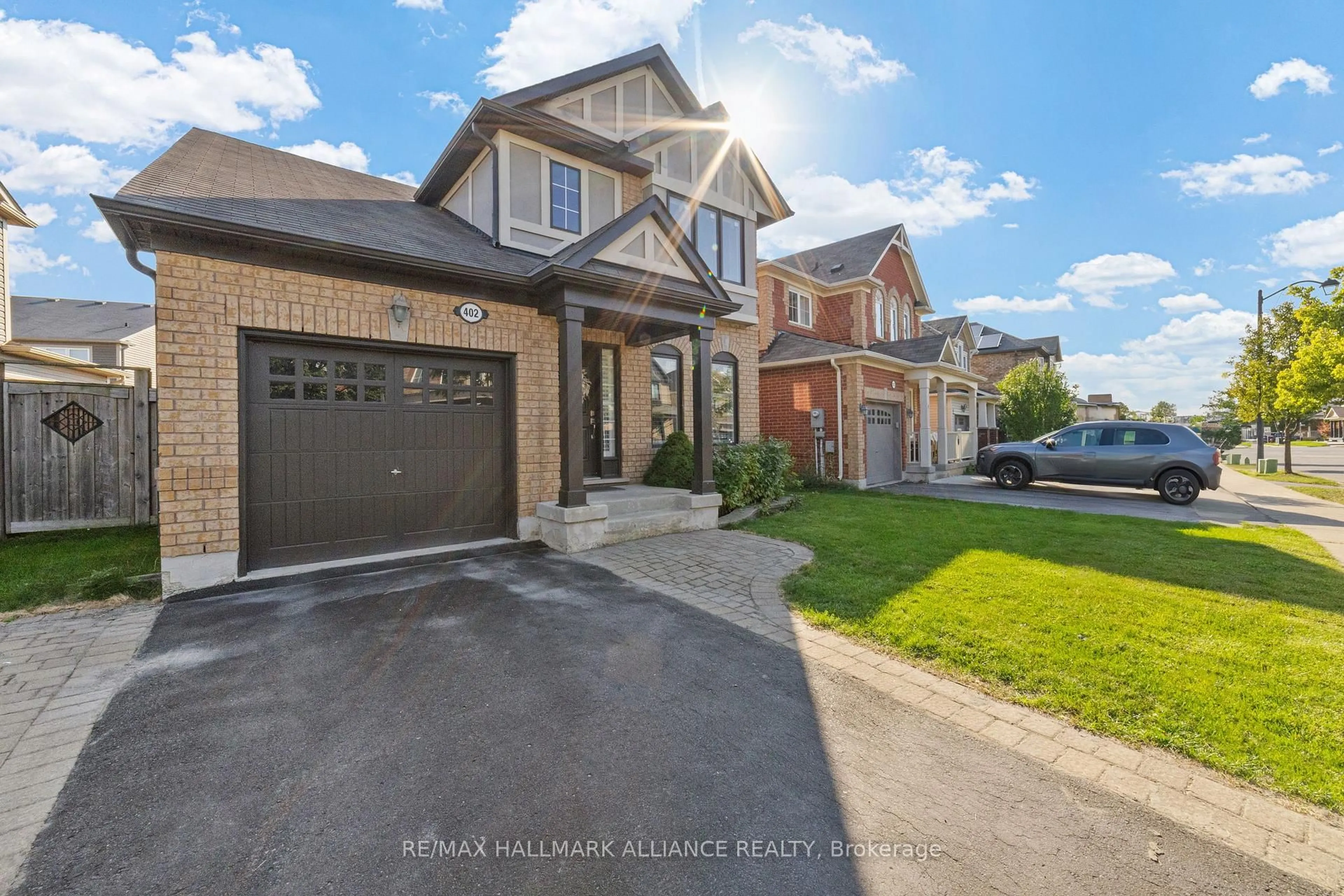 Home with brick exterior material, street for 402 Schreyer Cres, Milton Ontario L9T 7T2