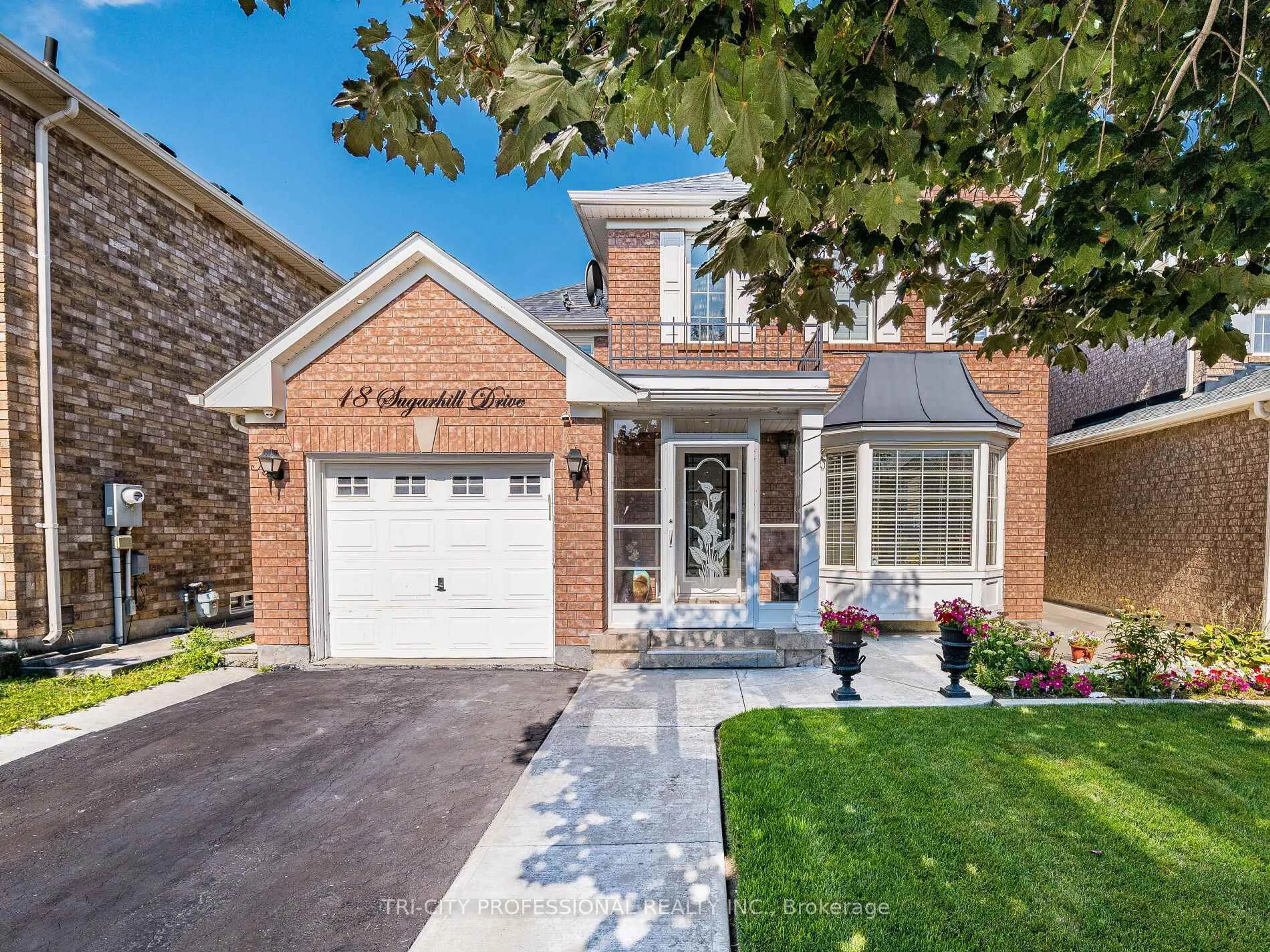 Home with brick exterior material, street for 18 Sugarhill Dr, Brampton Ontario L7A 3L8