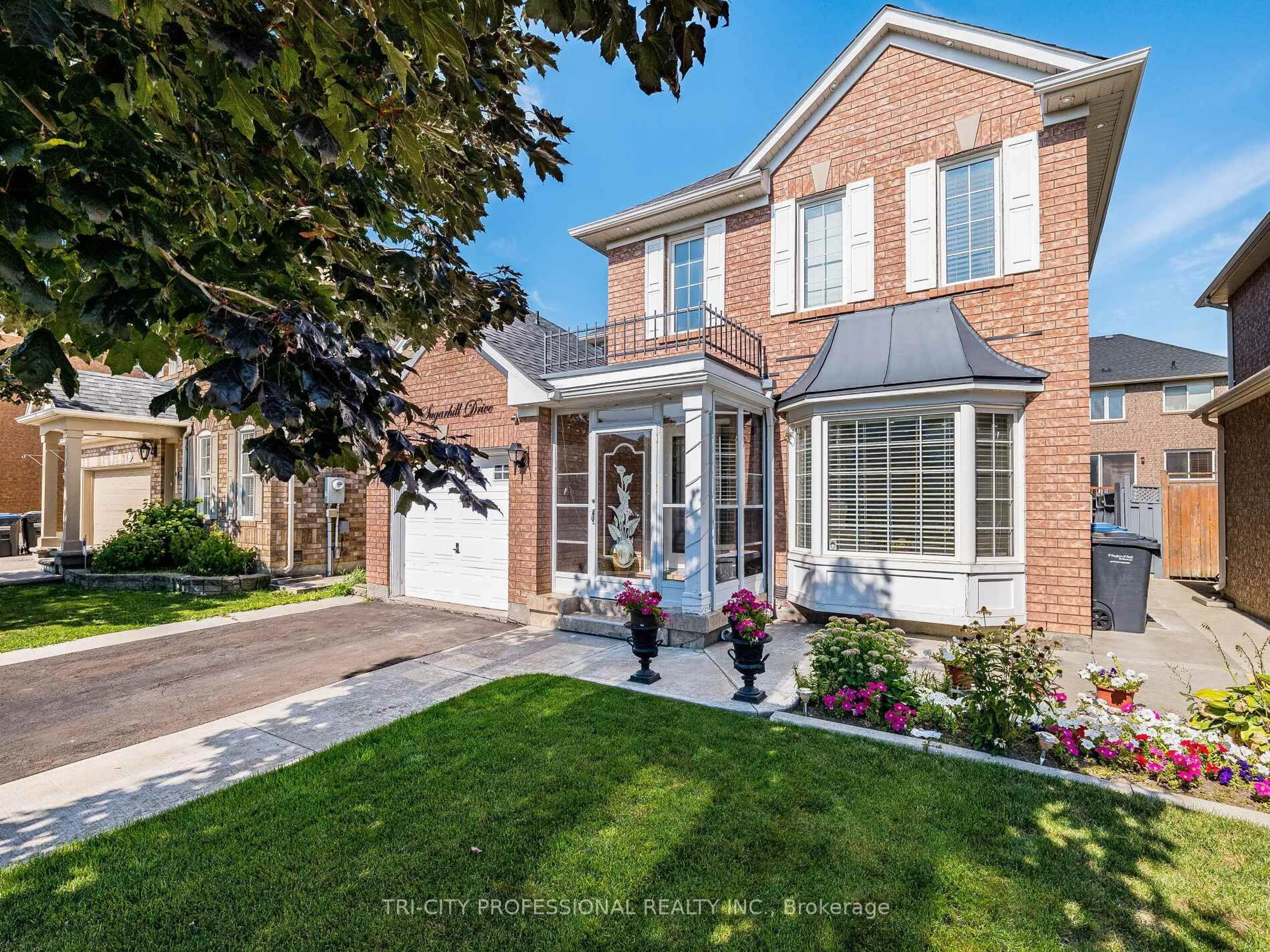 Home with brick exterior material, street for 18 Sugarhill Dr, Brampton Ontario L7A 3L8