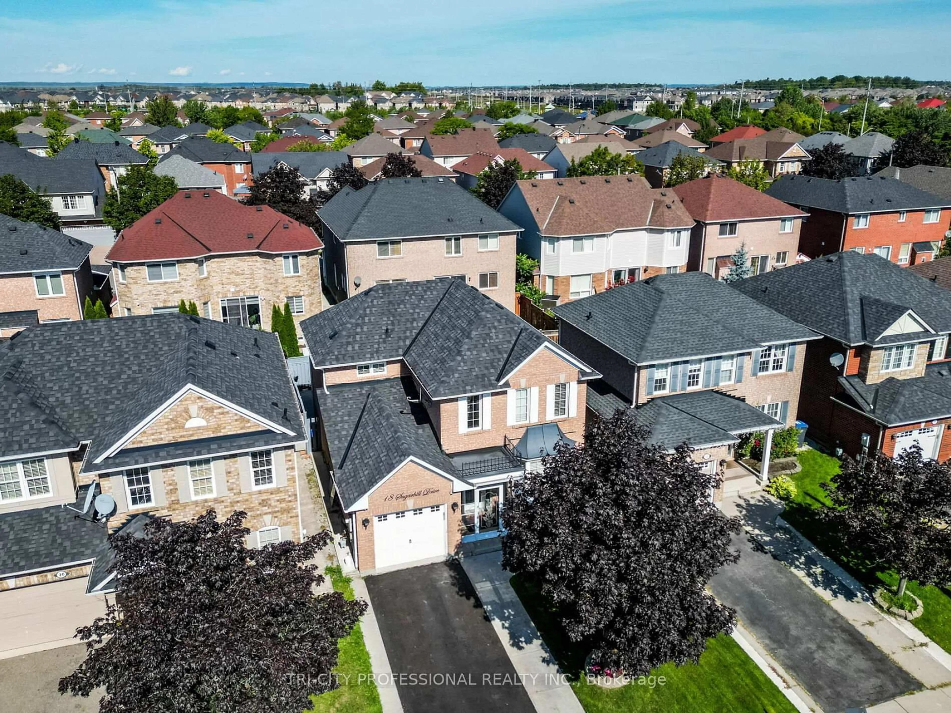 A pic from outside/outdoor area/front of a property/back of a property/a pic from drone, street for 18 Sugarhill Dr, Brampton Ontario L7A 3L8