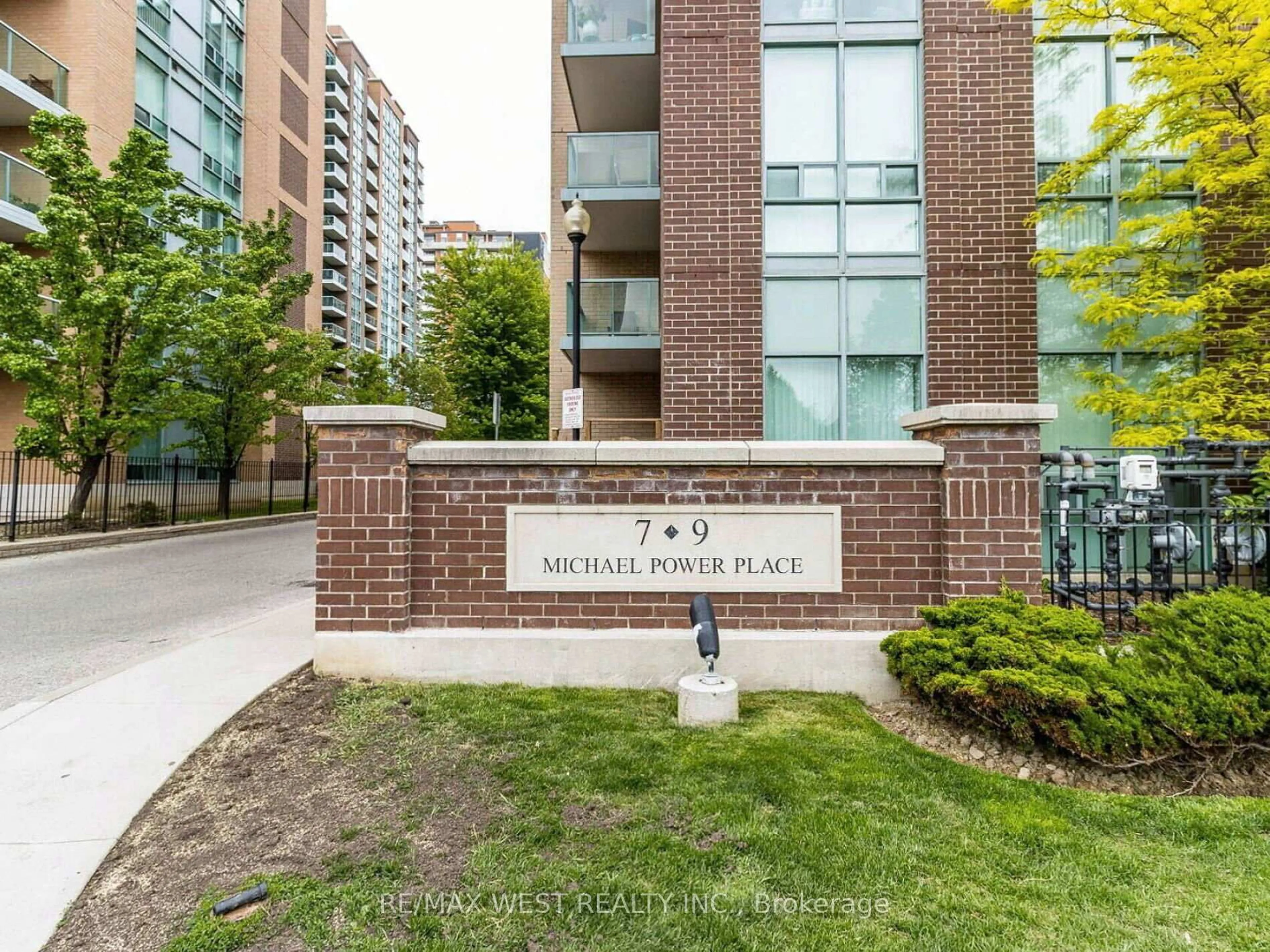 Home with brick exterior material, street for 9 Michael Power Pl #101, Toronto Ontario M9A 0A5
