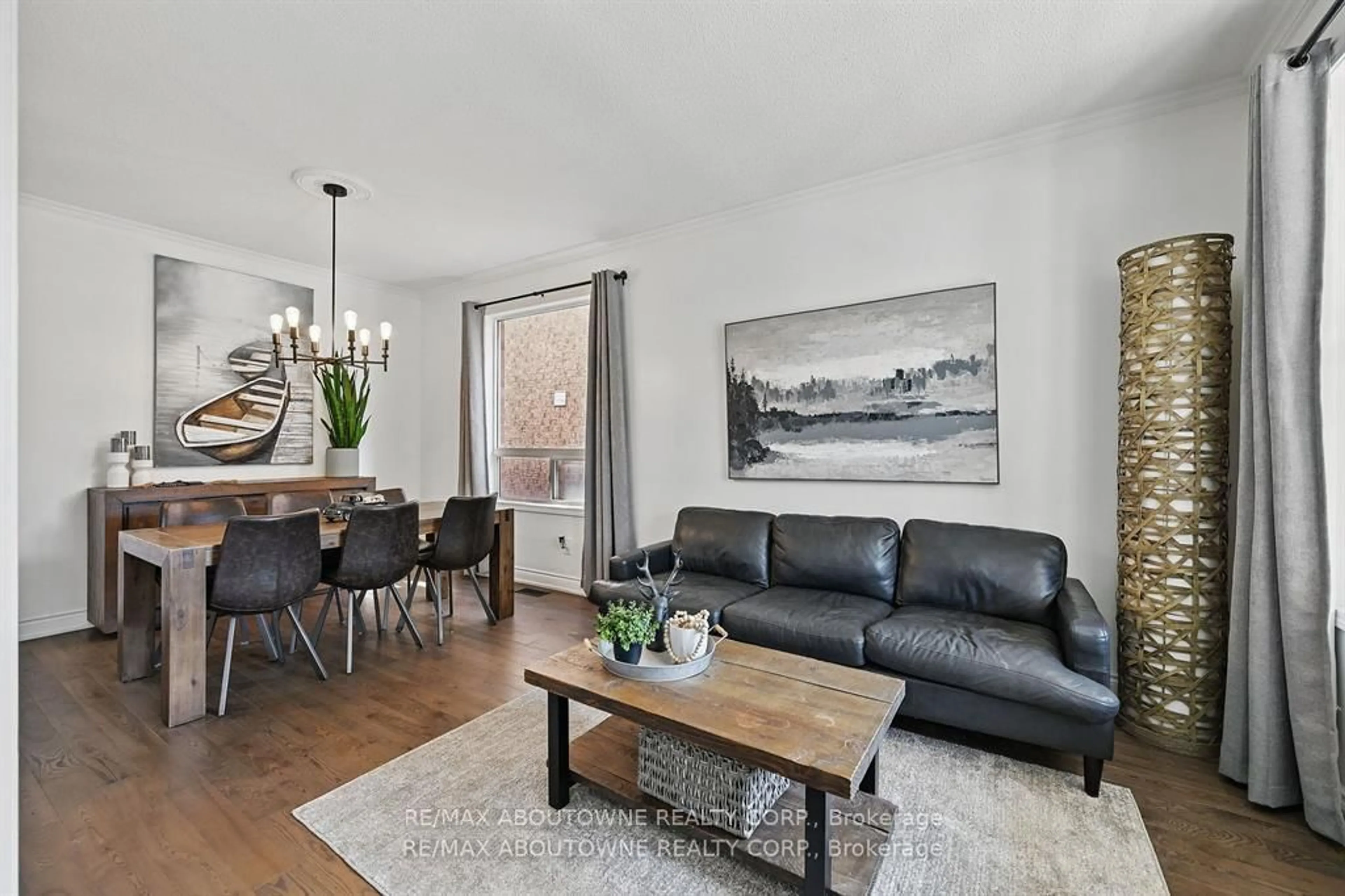 Living room with furniture, wood/laminate floor for 2536 Bracken Dr, Oakville Ontario L6M 4R7
