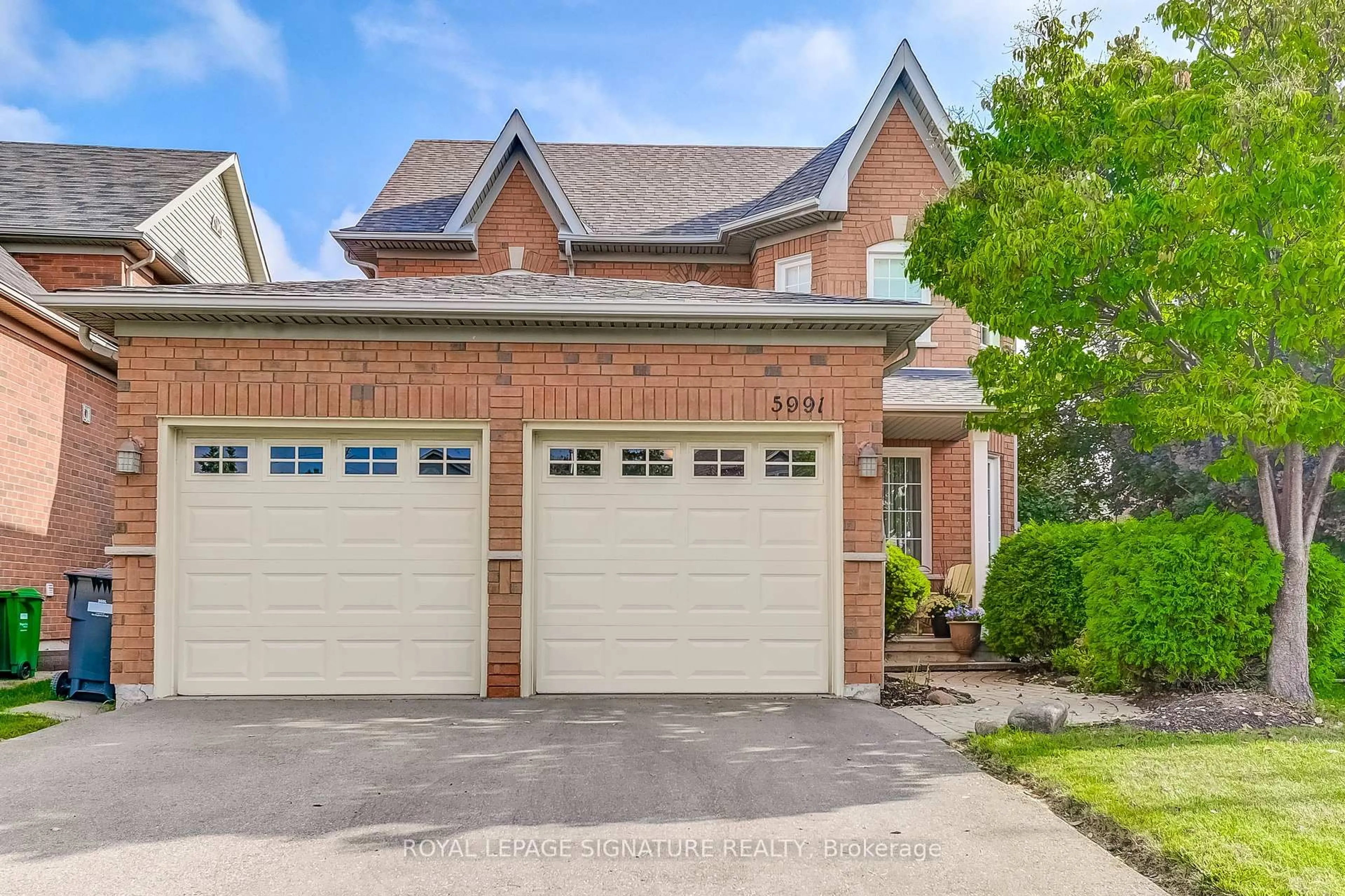 Home with brick exterior material, street for 5991 Greensboro Dr, Mississauga Ontario L5M 5S5