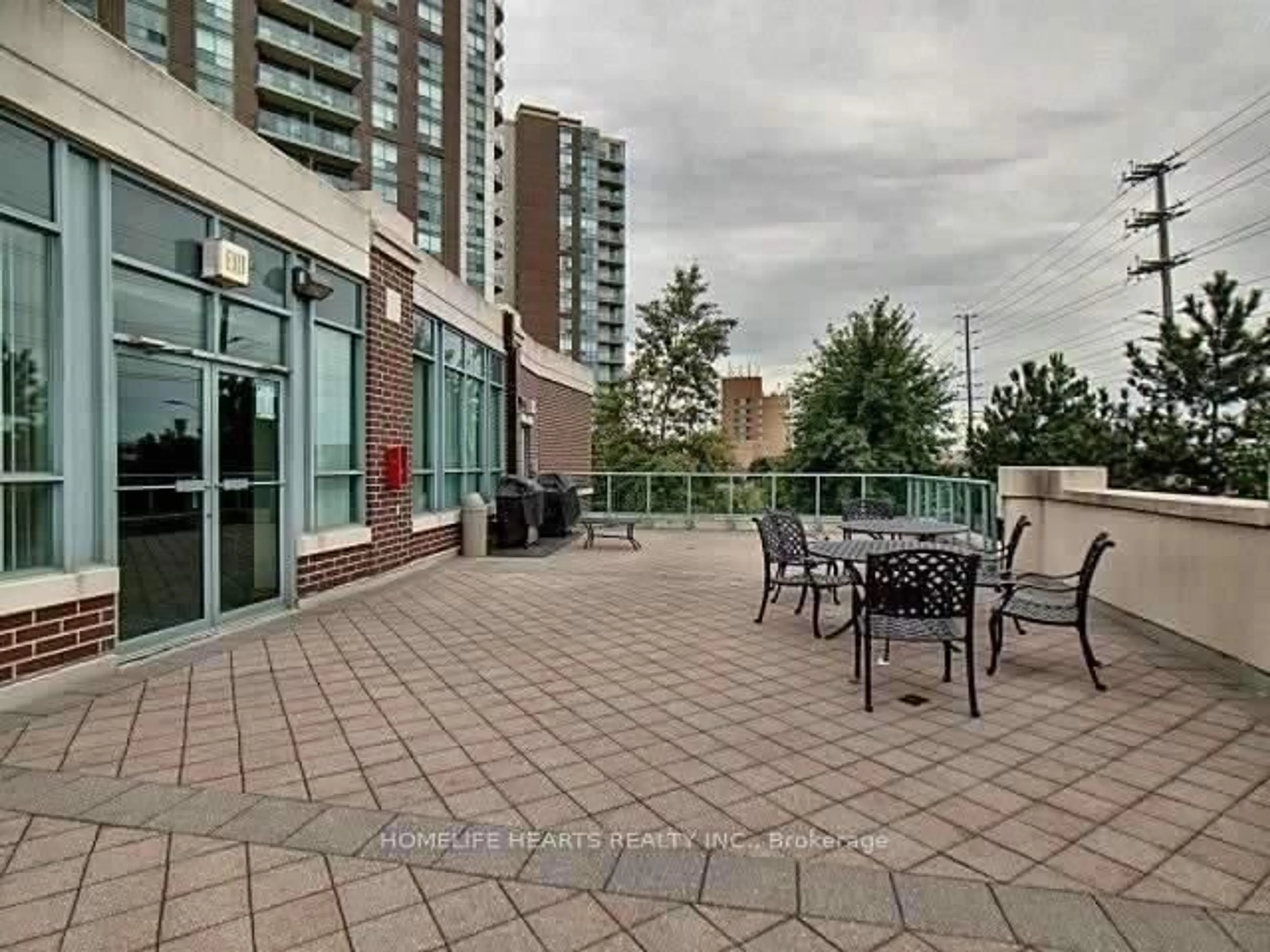 Patio, city buildings view from balcony for 4900 Glen Erin Dr #108, Mississauga Ontario L5M 7S2