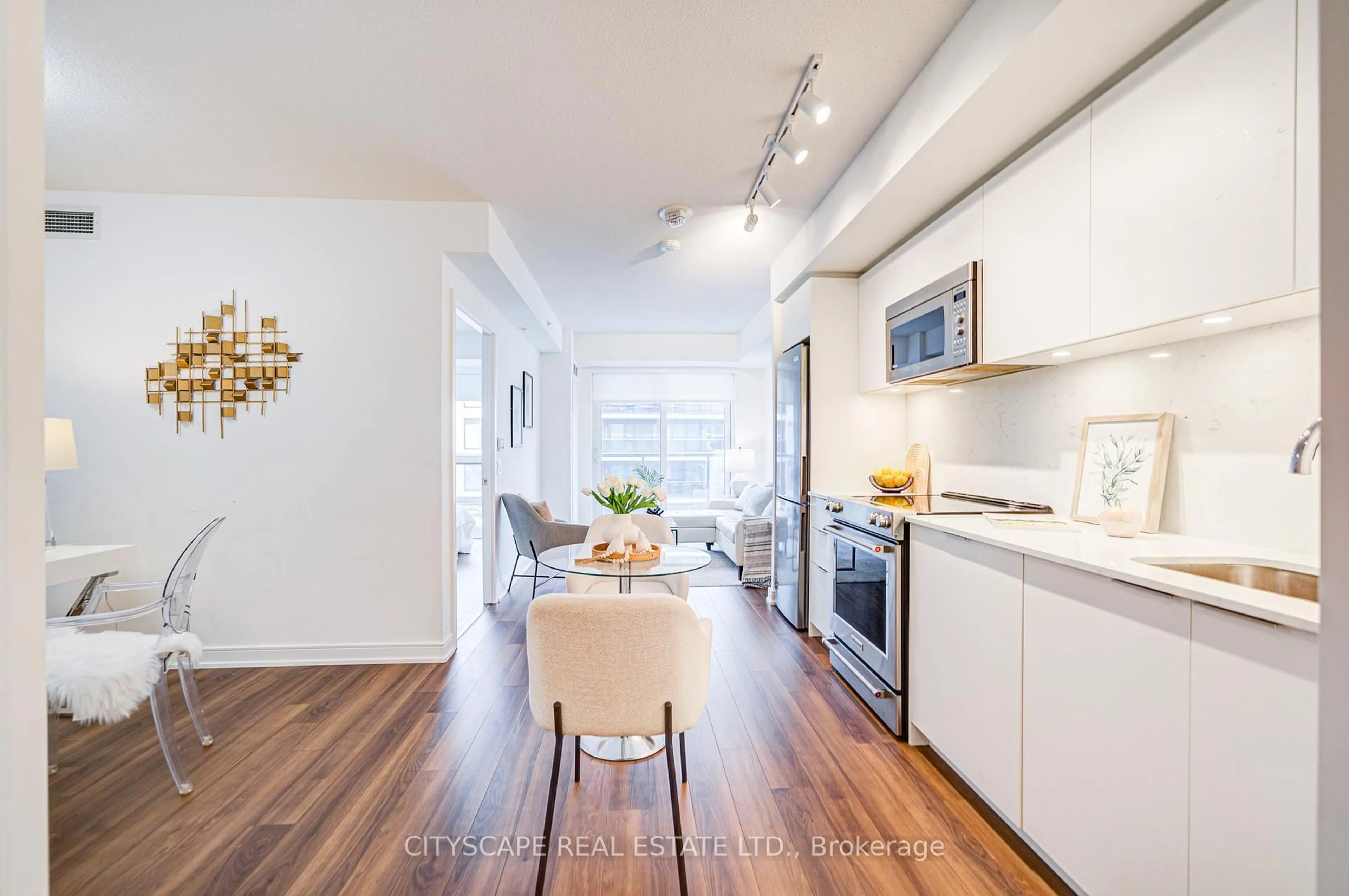 Open concept kitchen, wood/laminate floor for 30 Samuel Wood Way #1805, Toronto Ontario M9B 0C9