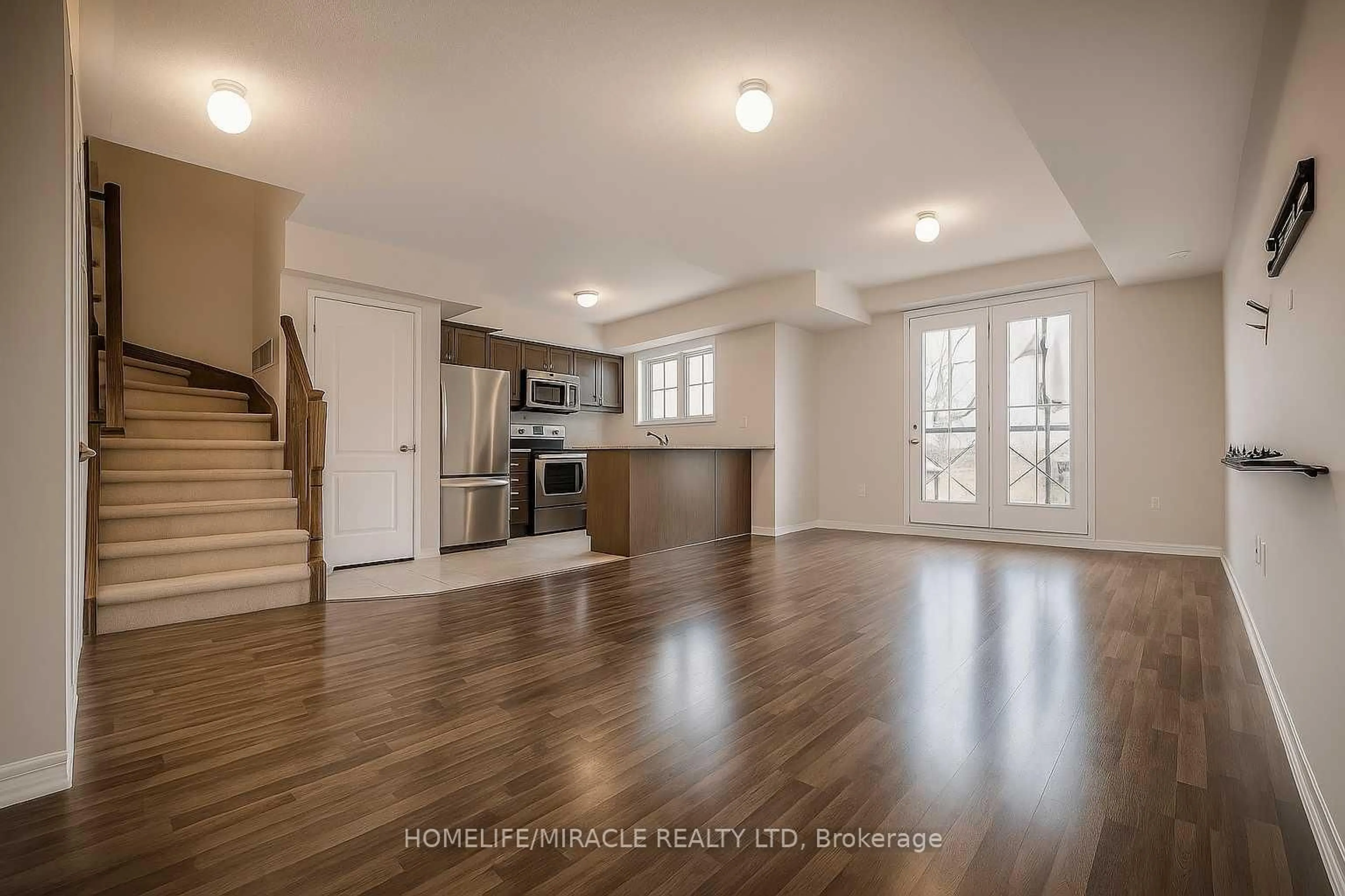 Open concept kitchen, wood/laminate floor for 2508 POST Rd #18, Oakville Ontario L6H 0K1