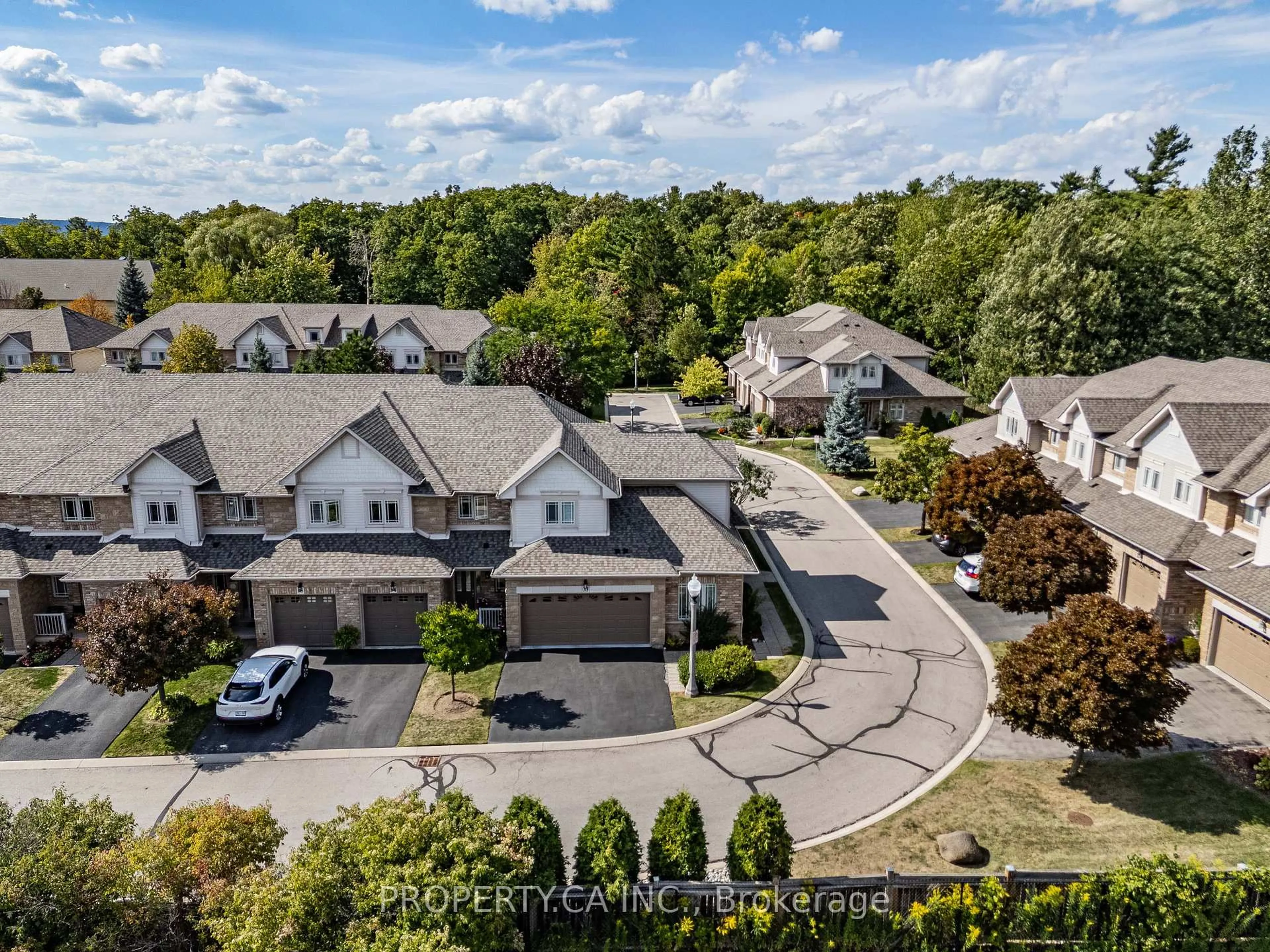 A pic from outside/outdoor area/front of a property/back of a property/a pic from drone, street for 2169 Orchard Rd #33, Burlington Ontario L7L 7J1