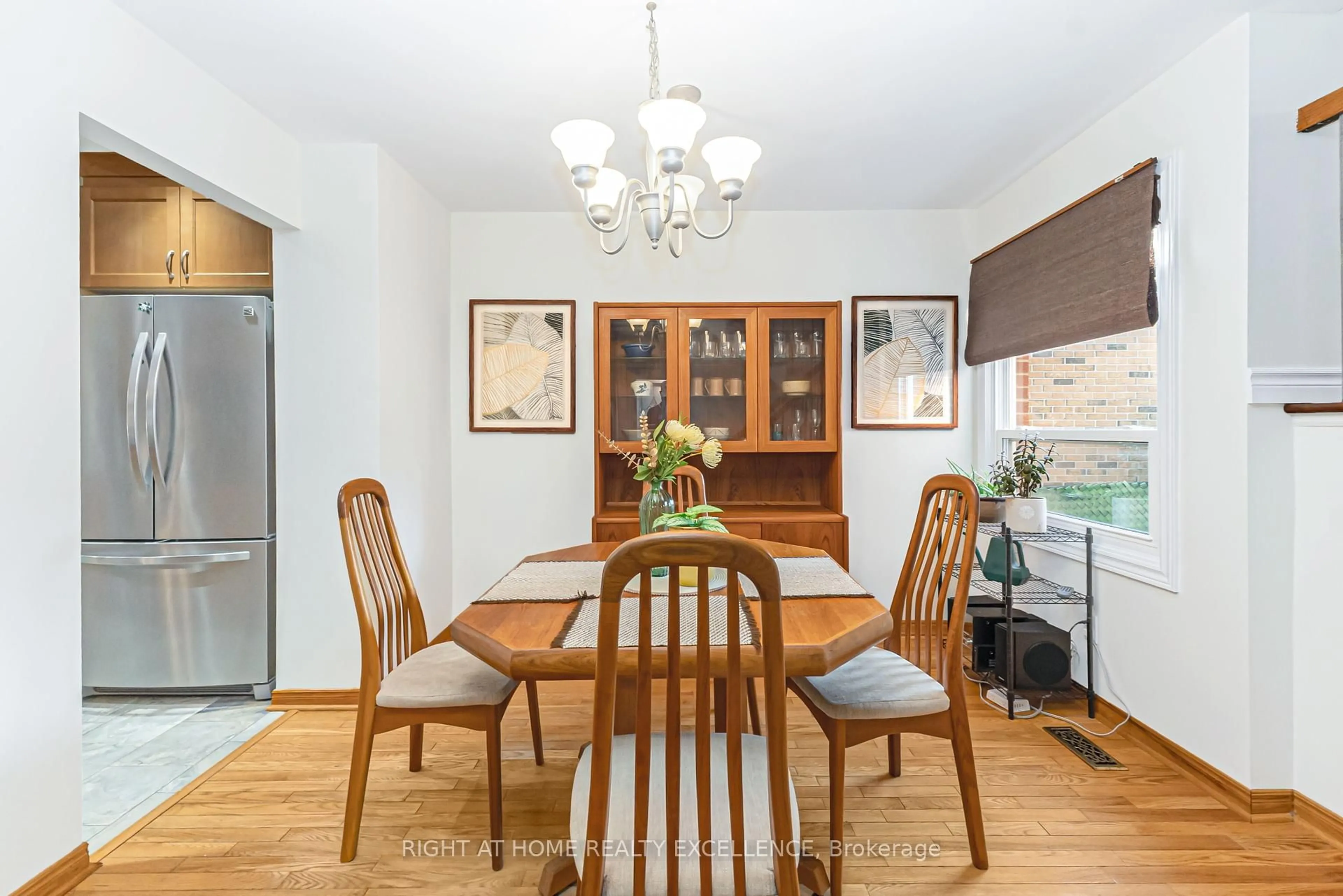 Dining room, wood/laminate floor for 13 Simmions Blvd, Brampton Ontario L6V 3V3