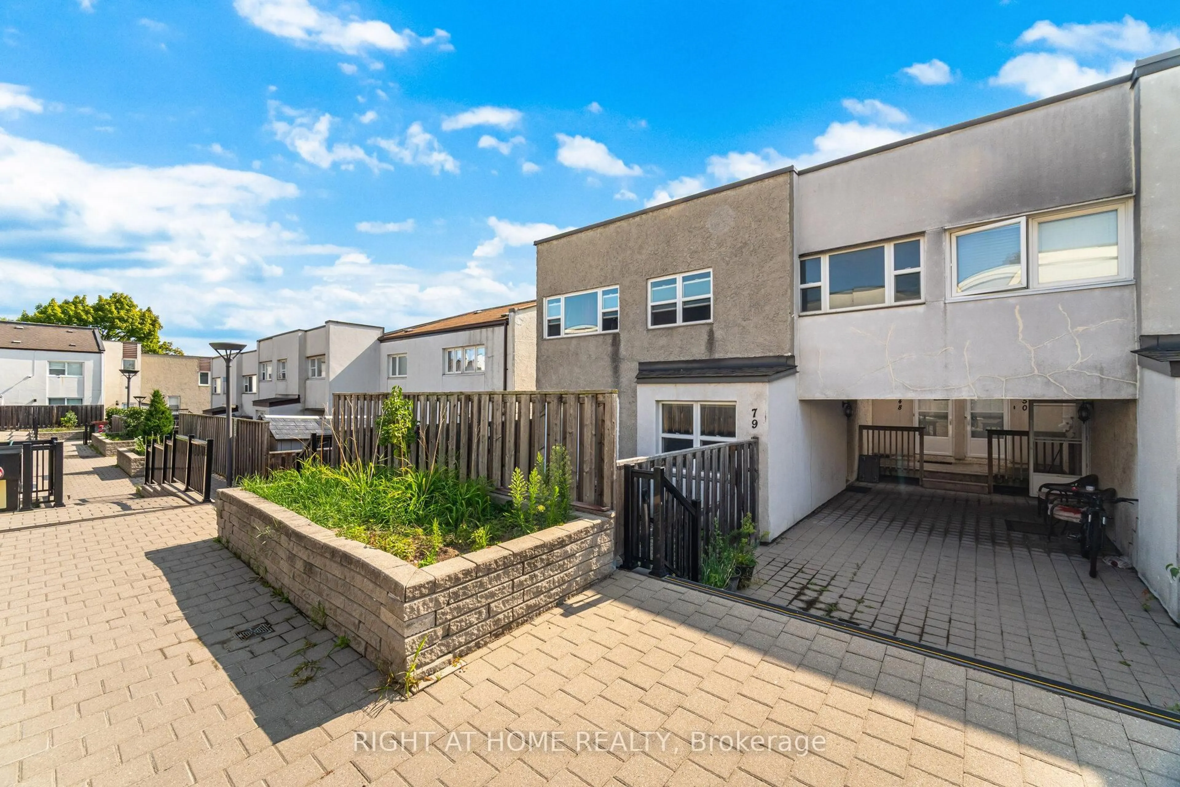 A pic from outside/outdoor area/front of a property/back of a property/a pic from drone, street for 3050 Constitution Blvd #79, Mississauga Ontario L4Y 3X1