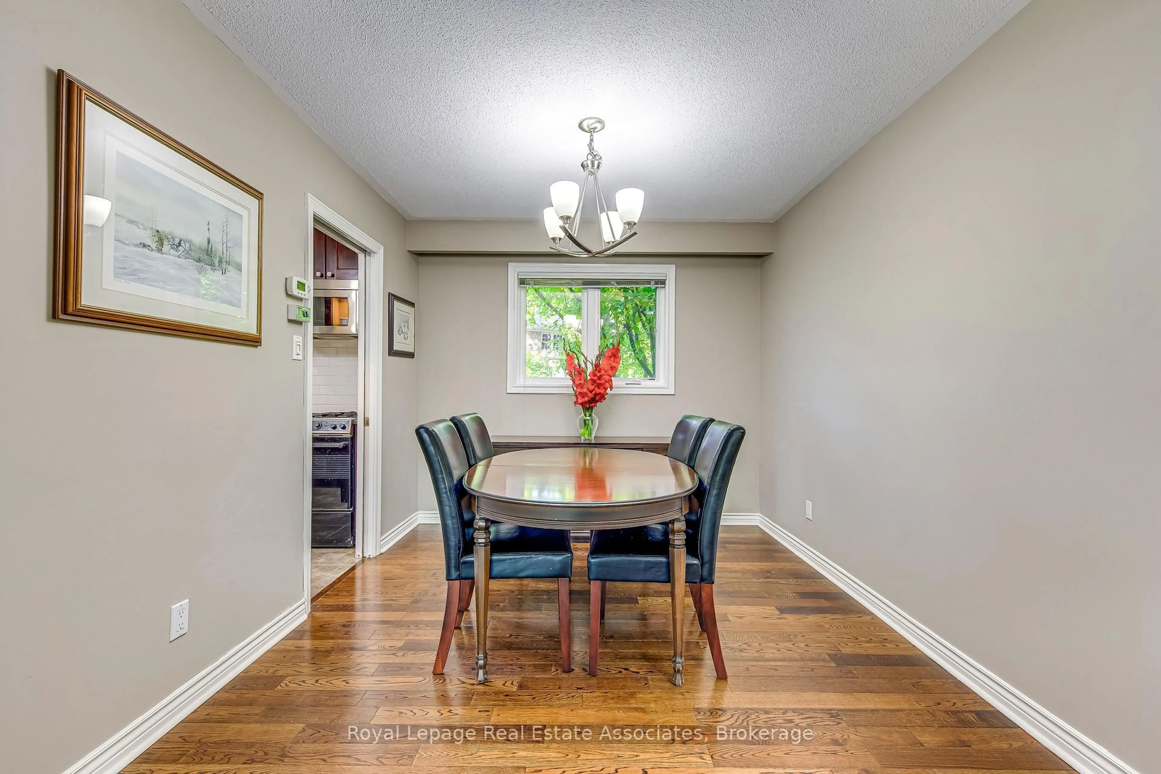 Dining room, wood/laminate floor for 2406 Buttonbush Cres, Mississauga Ontario L5L 1C5