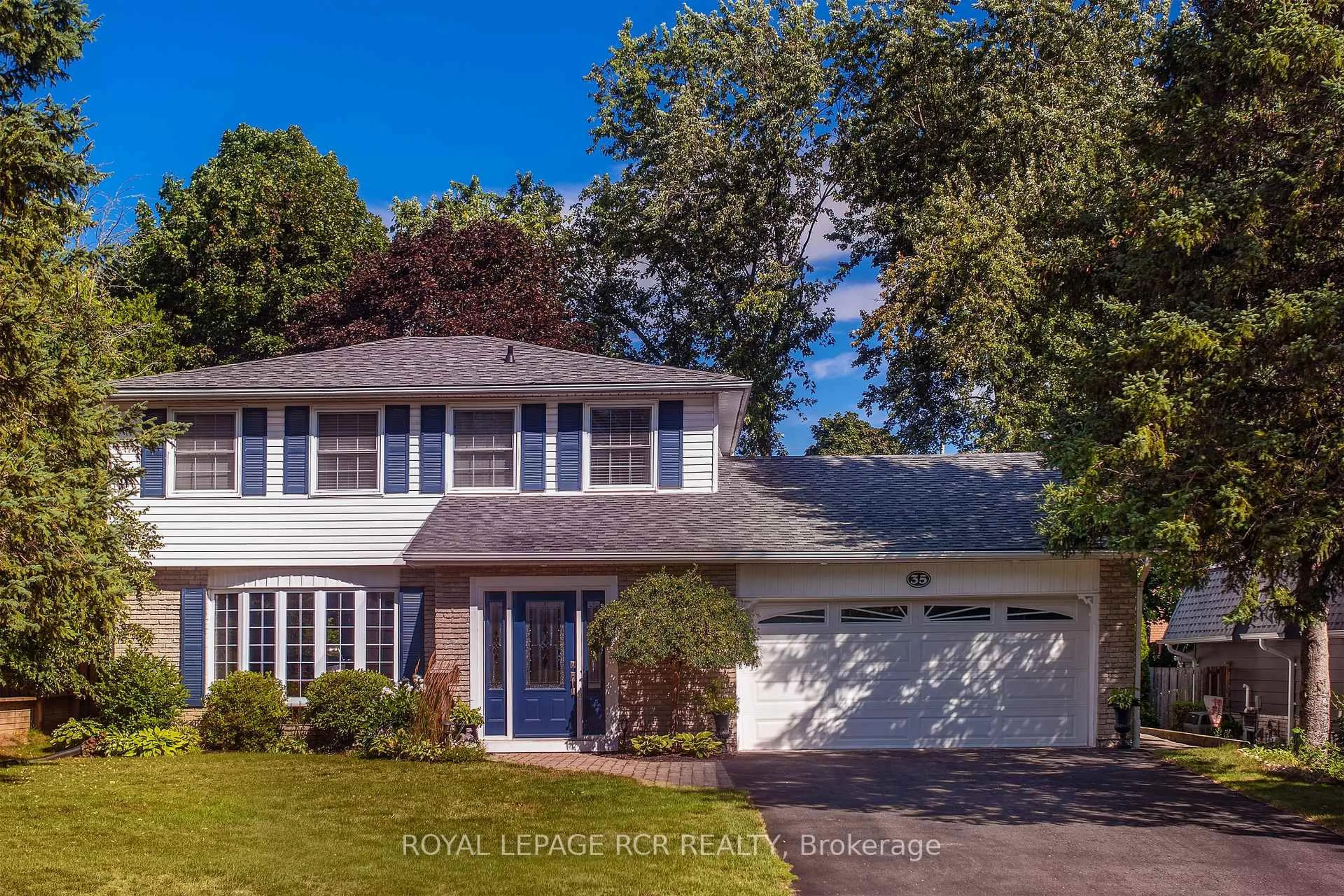 Home with vinyl exterior material, street for 35 Elm Ave, Orangeville Ontario L9W 3G3