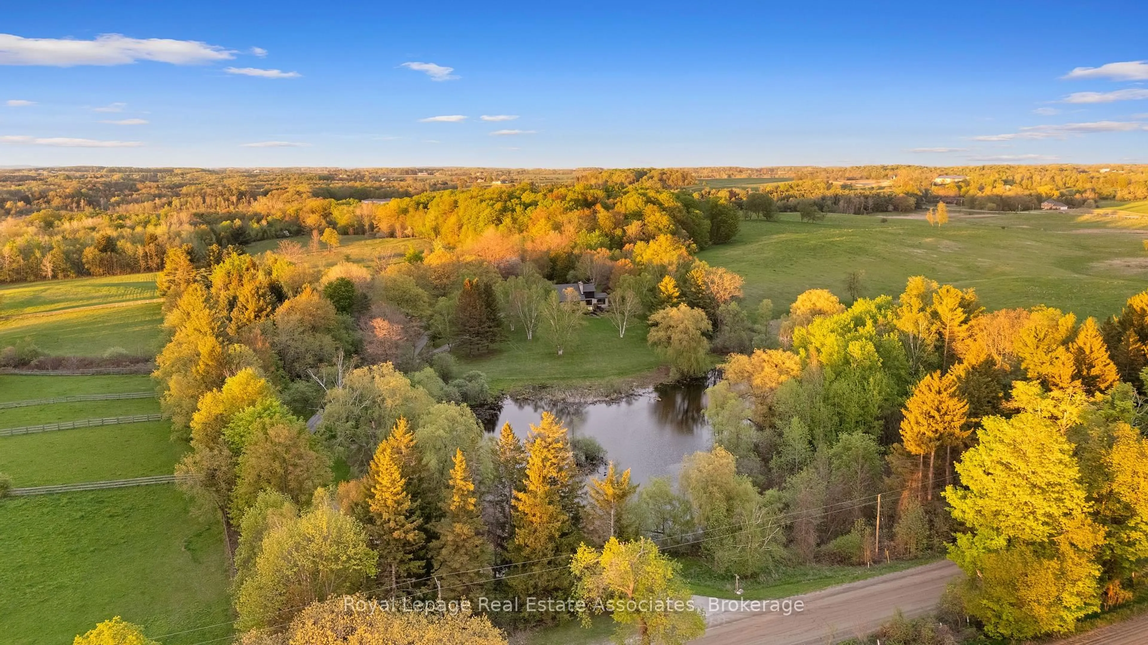 A pic from outside/outdoor area/front of a property/back of a property/a pic from drone, water/lake/river/ocean view for 15633 Kennedy Rd, Caledon Ontario L7C 2H7