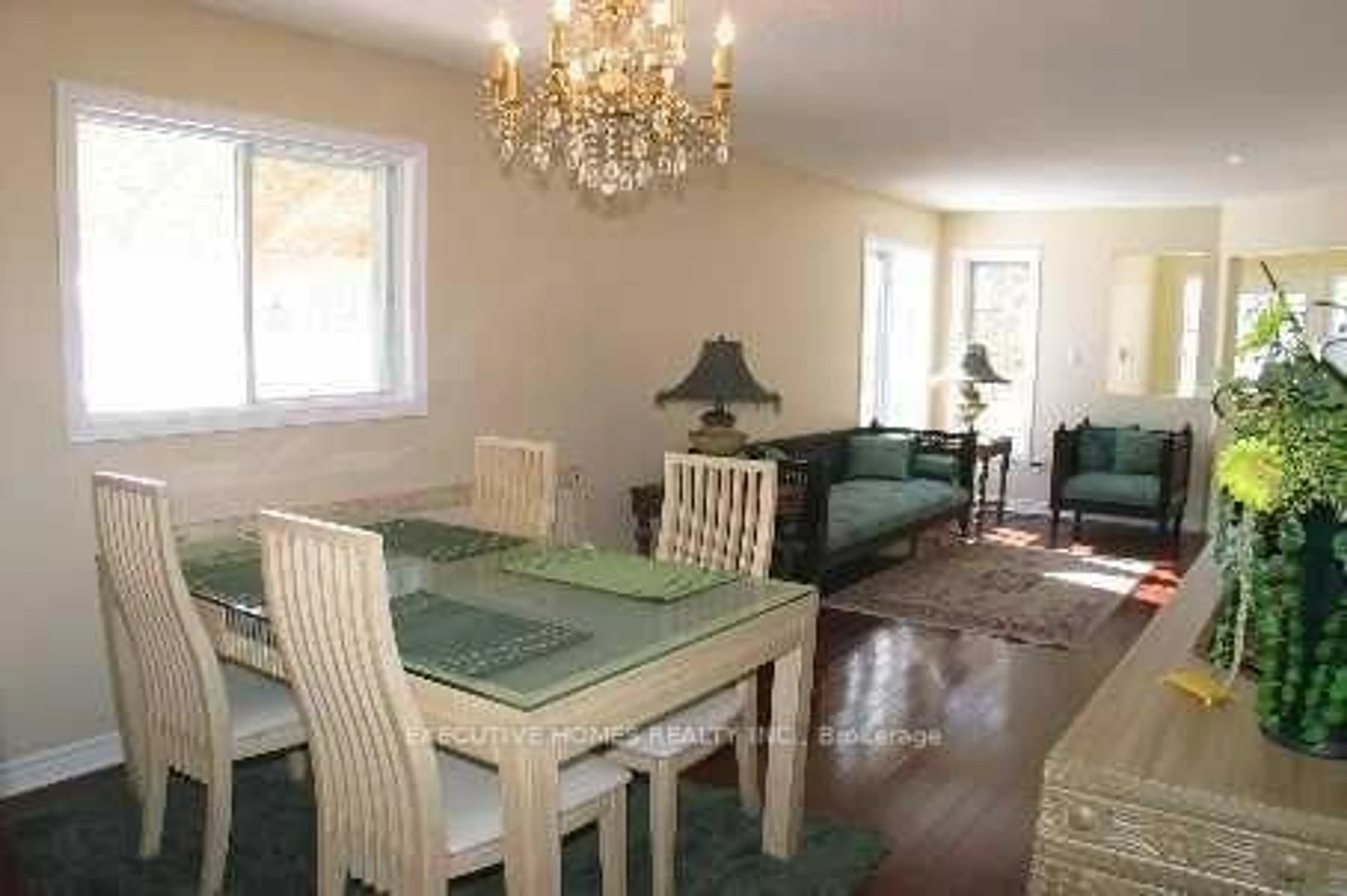 Dining room, wood/laminate floor for 202 Wildwood Tr, Mississauga Ontario L4Z 3S5
