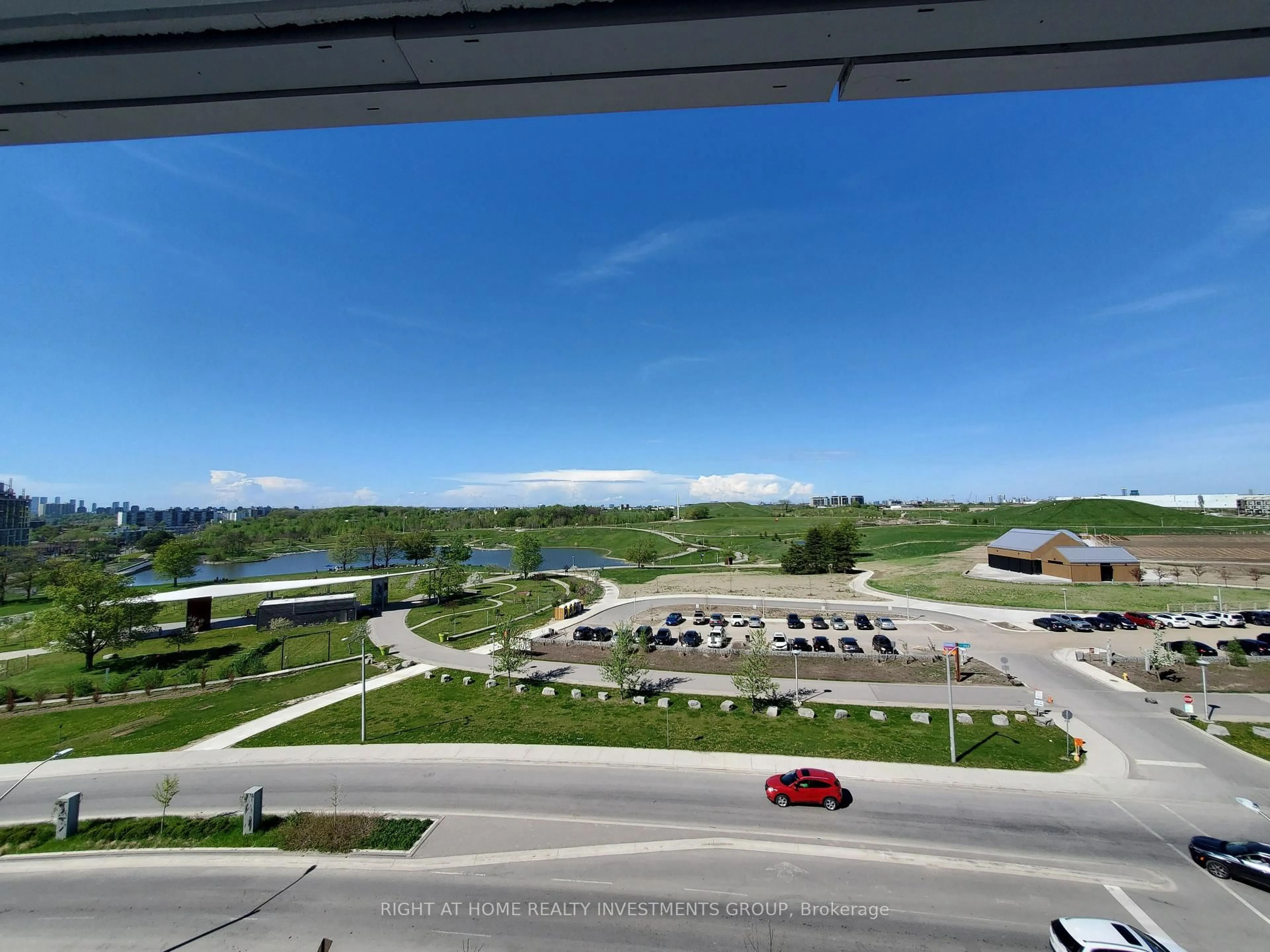 A pic from outside/outdoor area/front of a property/back of a property/a pic from drone, city buildings view from balcony for 60 George Butchart Dr #506, Toronto Ontario M3K 0E1