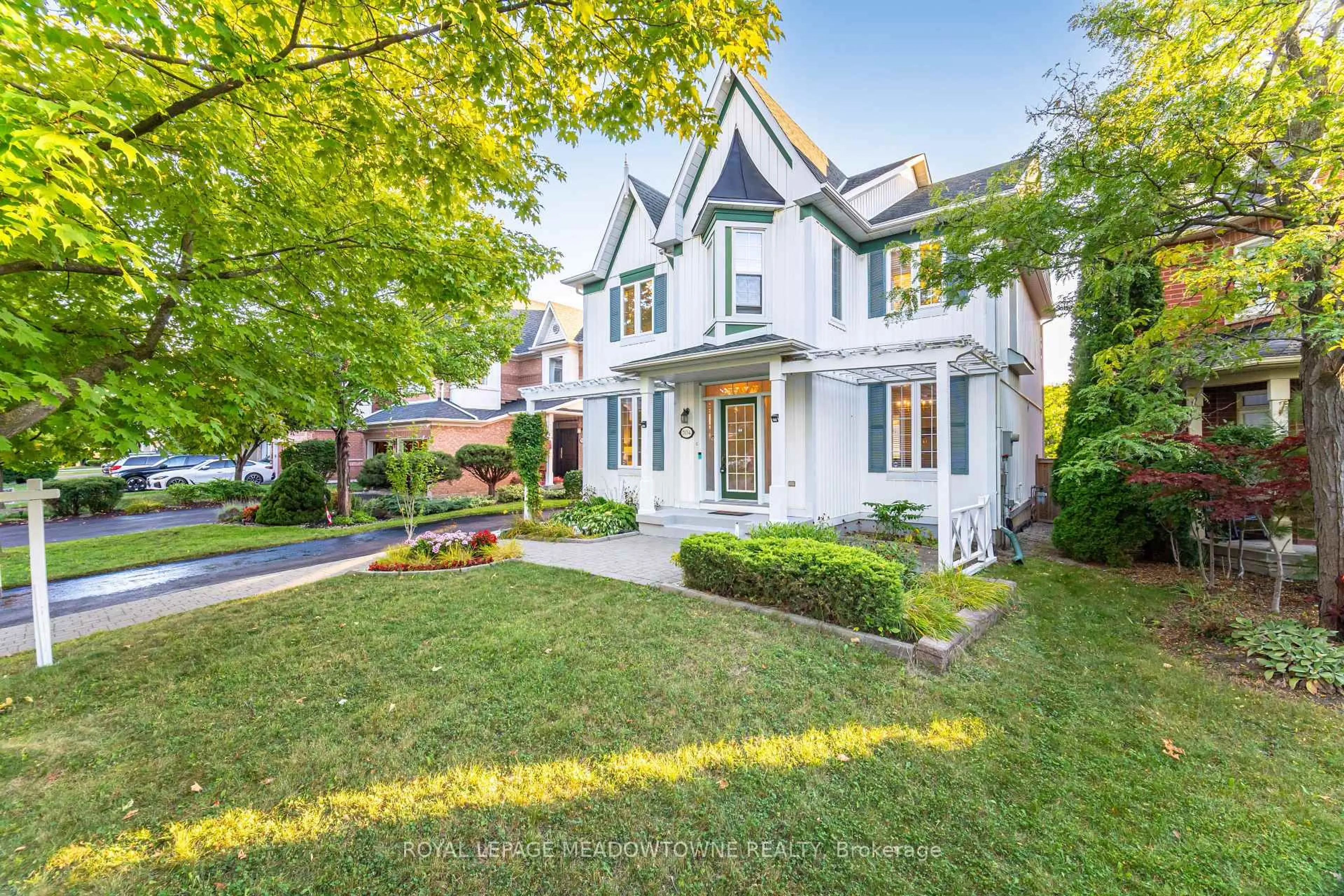 Home with brick exterior material, street for 7034 Lessard Lane, Mississauga Ontario L5W 1A4