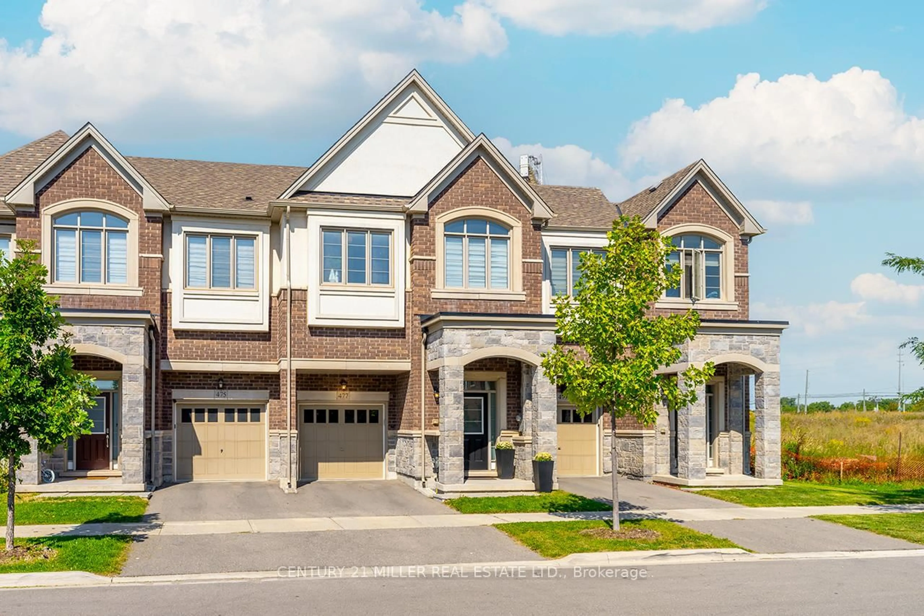 Home with brick exterior material, street for 477 Izumi Gate, Milton Ontario L9E 1J7