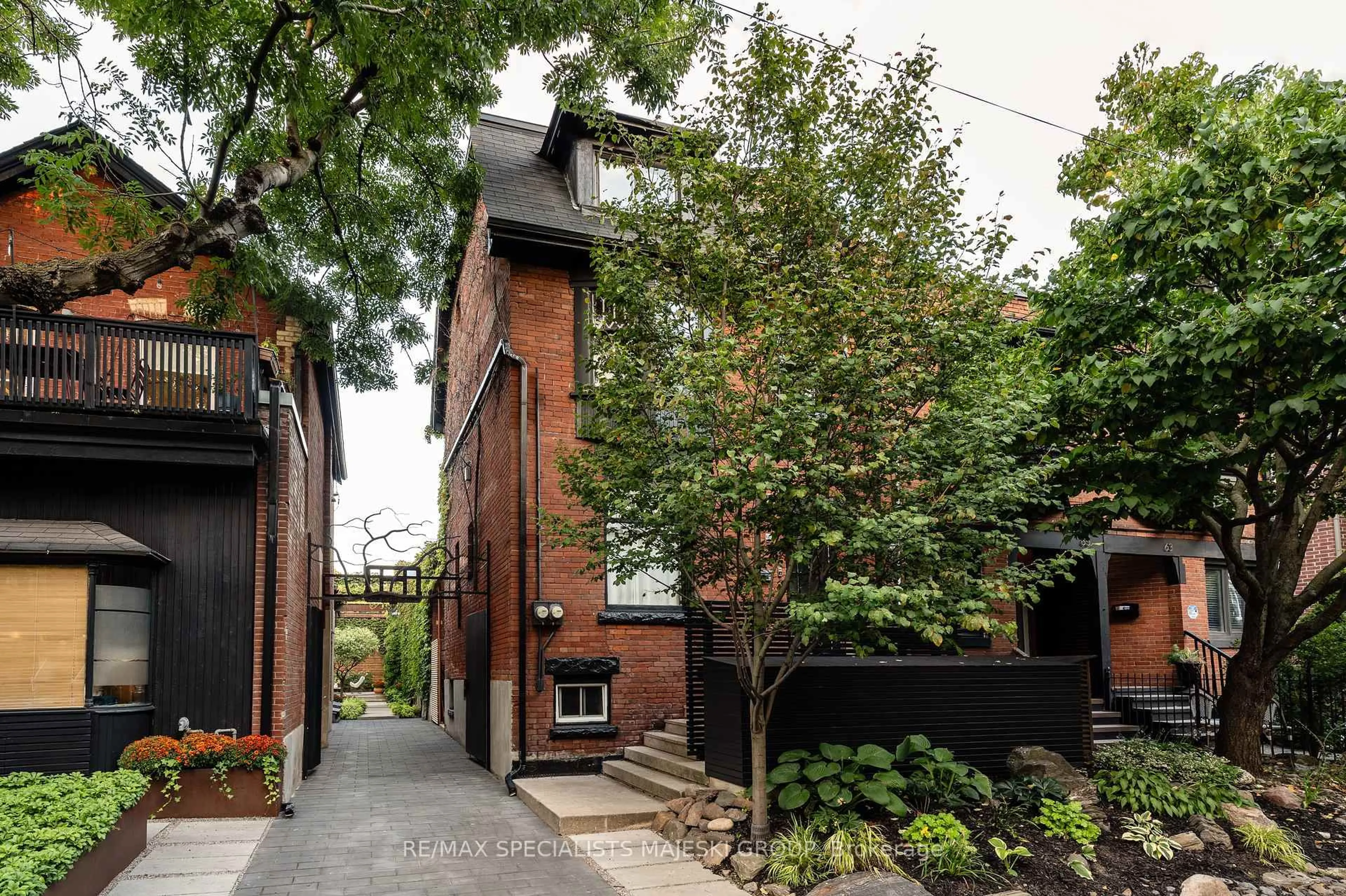 Home with brick exterior material, street for 67 Elm Grove Ave, Toronto Ontario M6K 2J2
