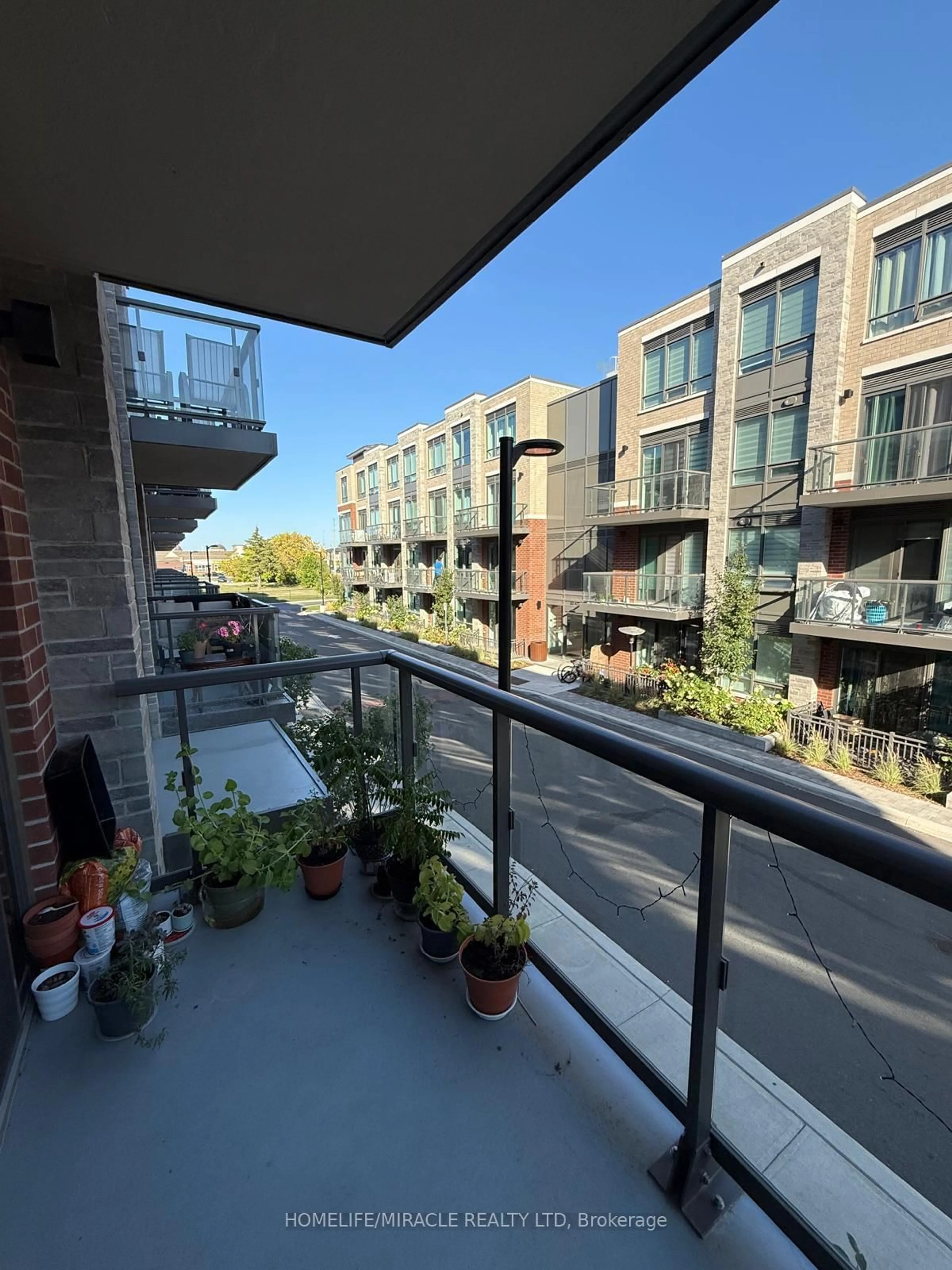 Balcony in the apartment, city buildings view from balcony for 75 Attmar Dr #241, Brampton Ontario L6P 0Y6
