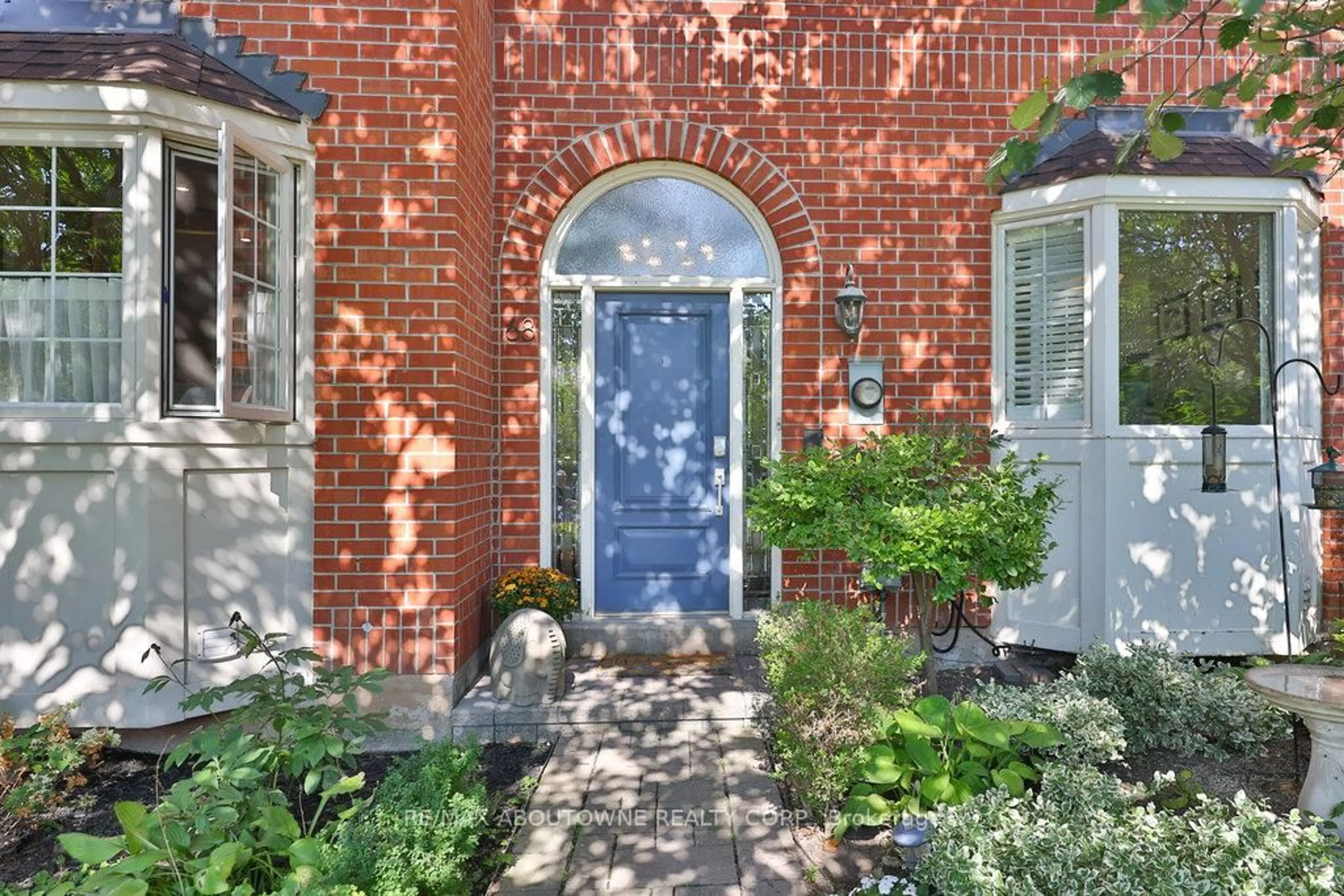Home with brick exterior material, street for 68 Tradewind Dr, Oakville Ontario L6L 6K9