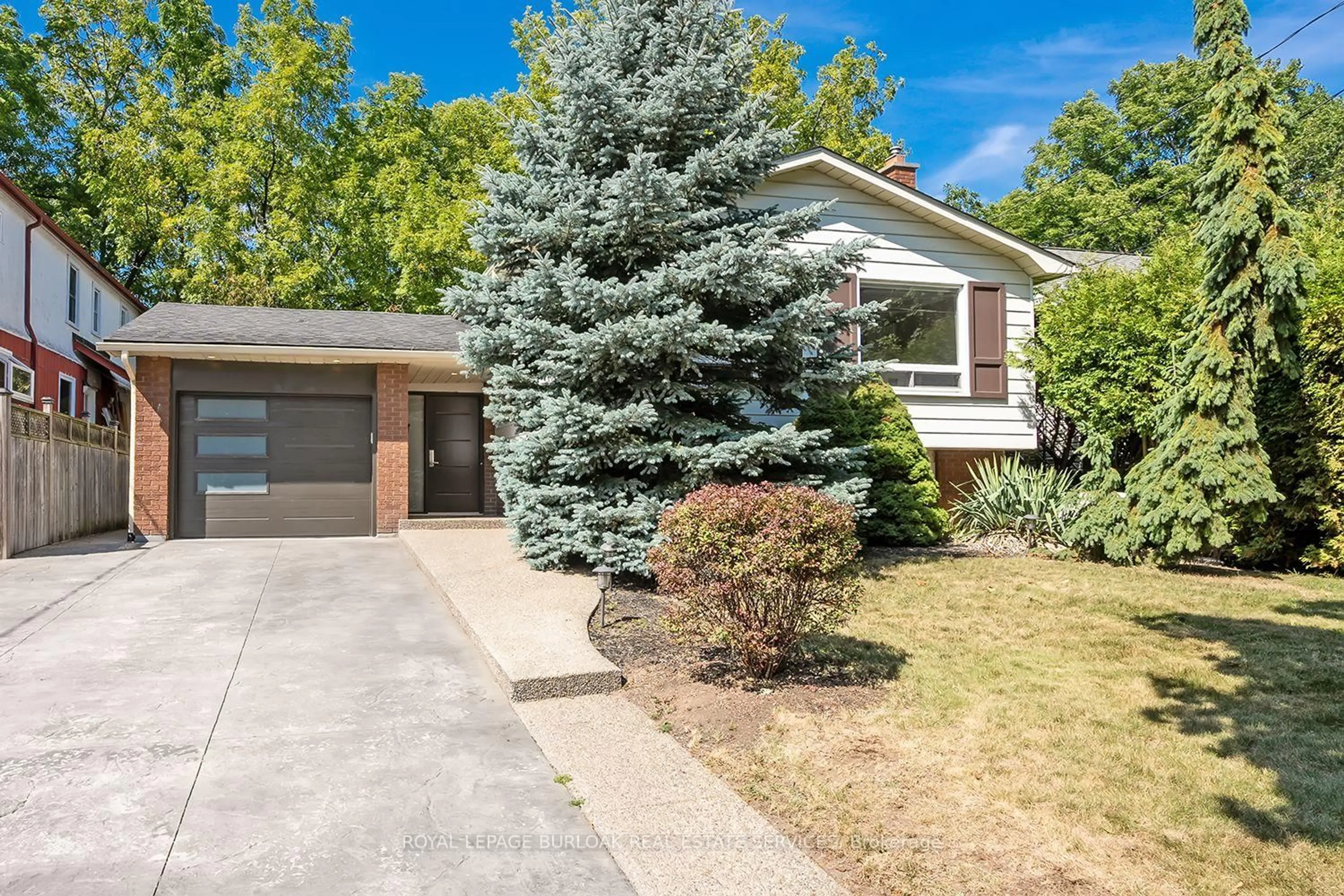Home with brick exterior material, street for 1207 Richmond Rd, Burlington Ontario L7S 1K5