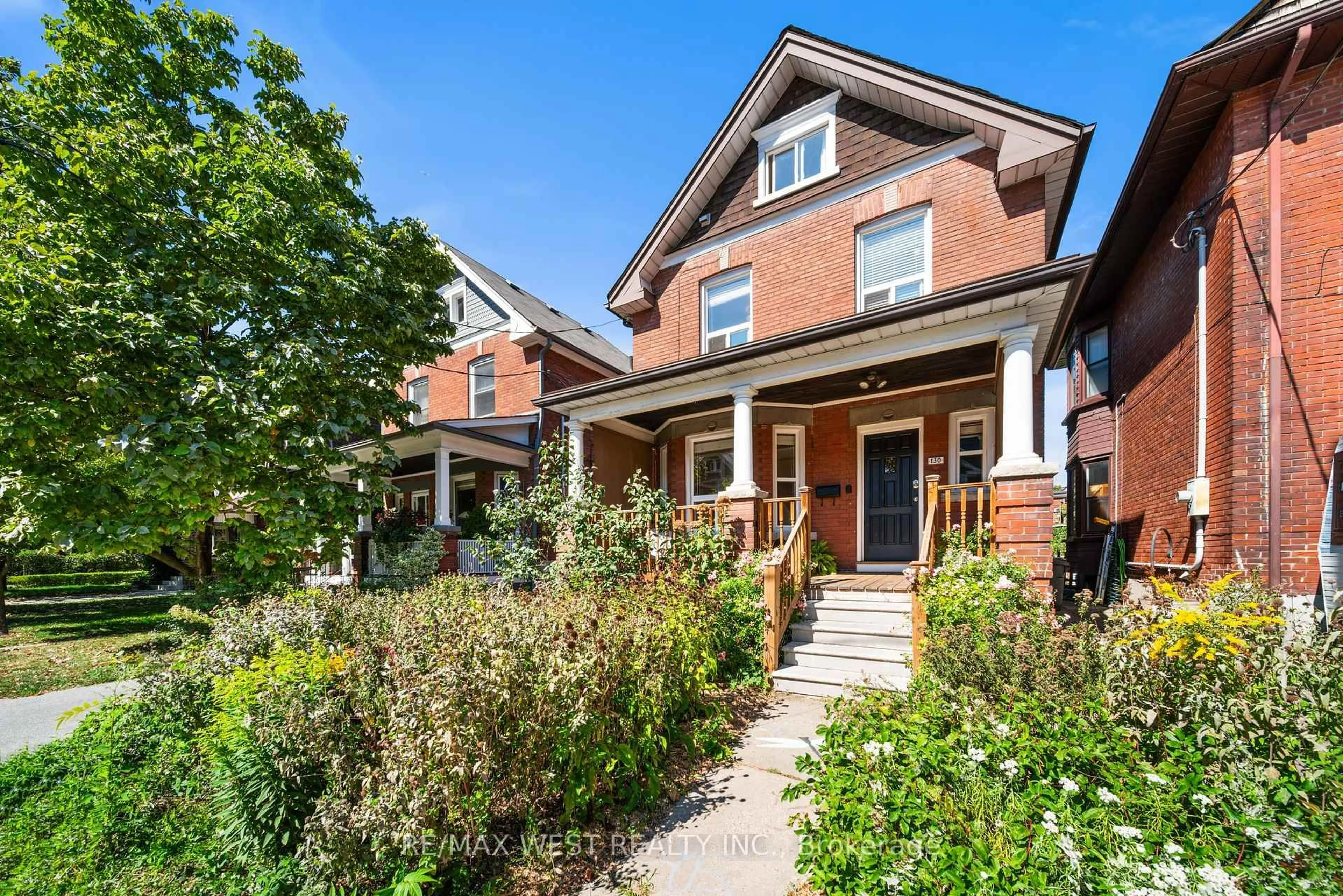 Home with brick exterior material, street for 130 St. Johns Rd, Toronto Ontario M6P 1T9
