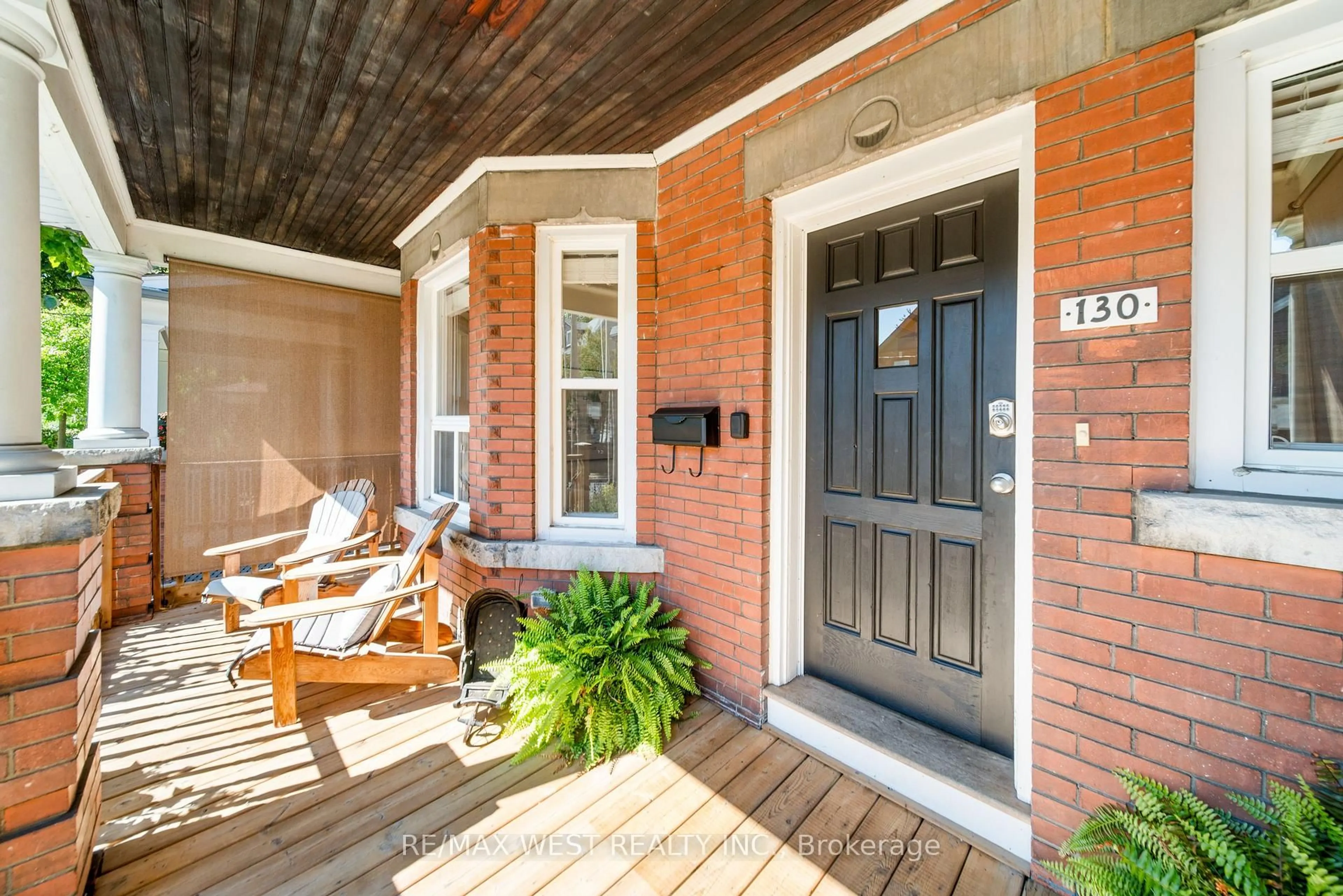 Home with brick exterior material, street for 130 St. Johns Rd, Toronto Ontario M6P 1T9