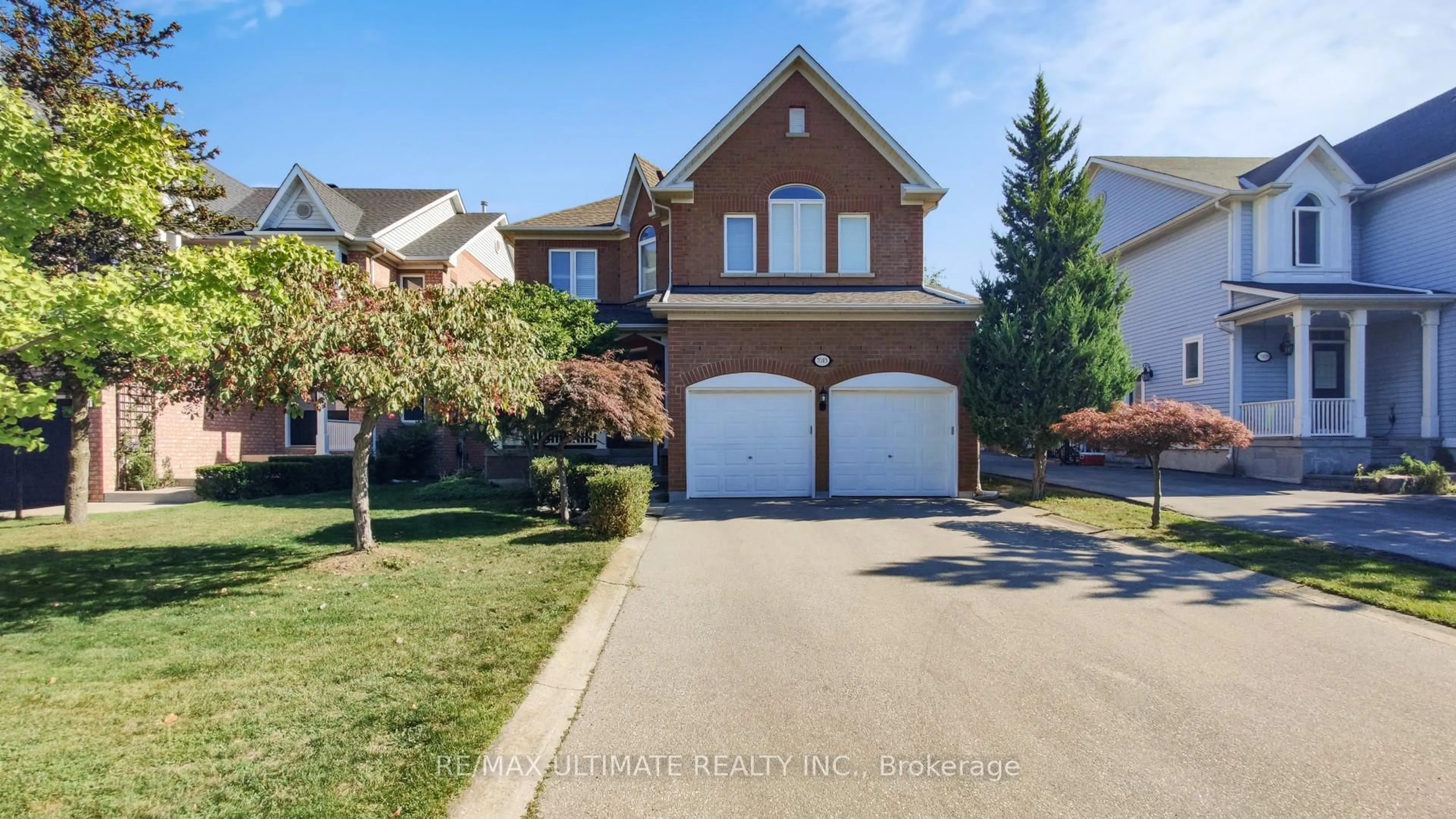 Home with brick exterior material, street for 7013 Lessard Lane, Mississauga Ontario L5W 1A4