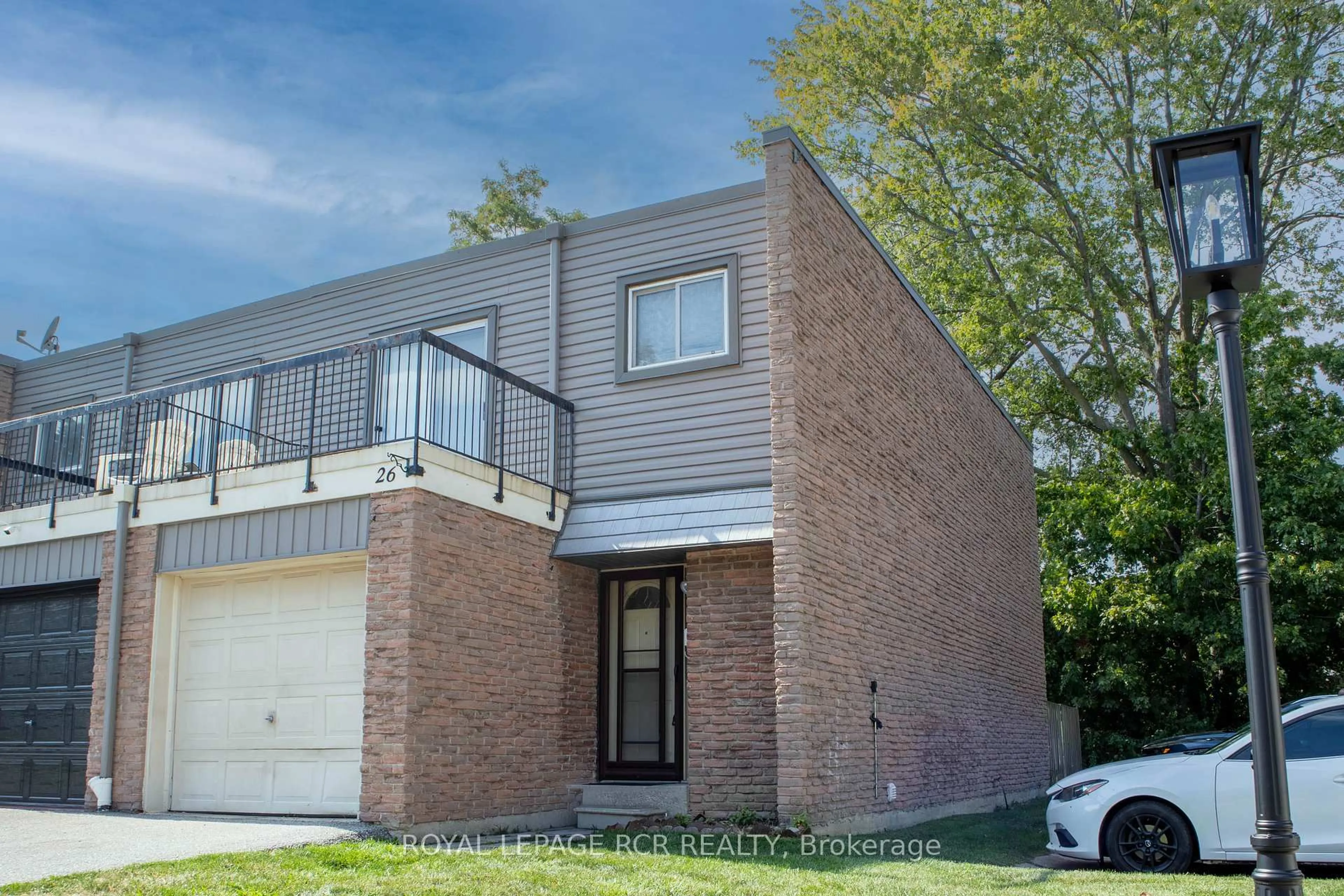 Home with brick exterior material, street for 2315 Bromsgrove Rd #26, Mississauga Ontario L5J 4A6