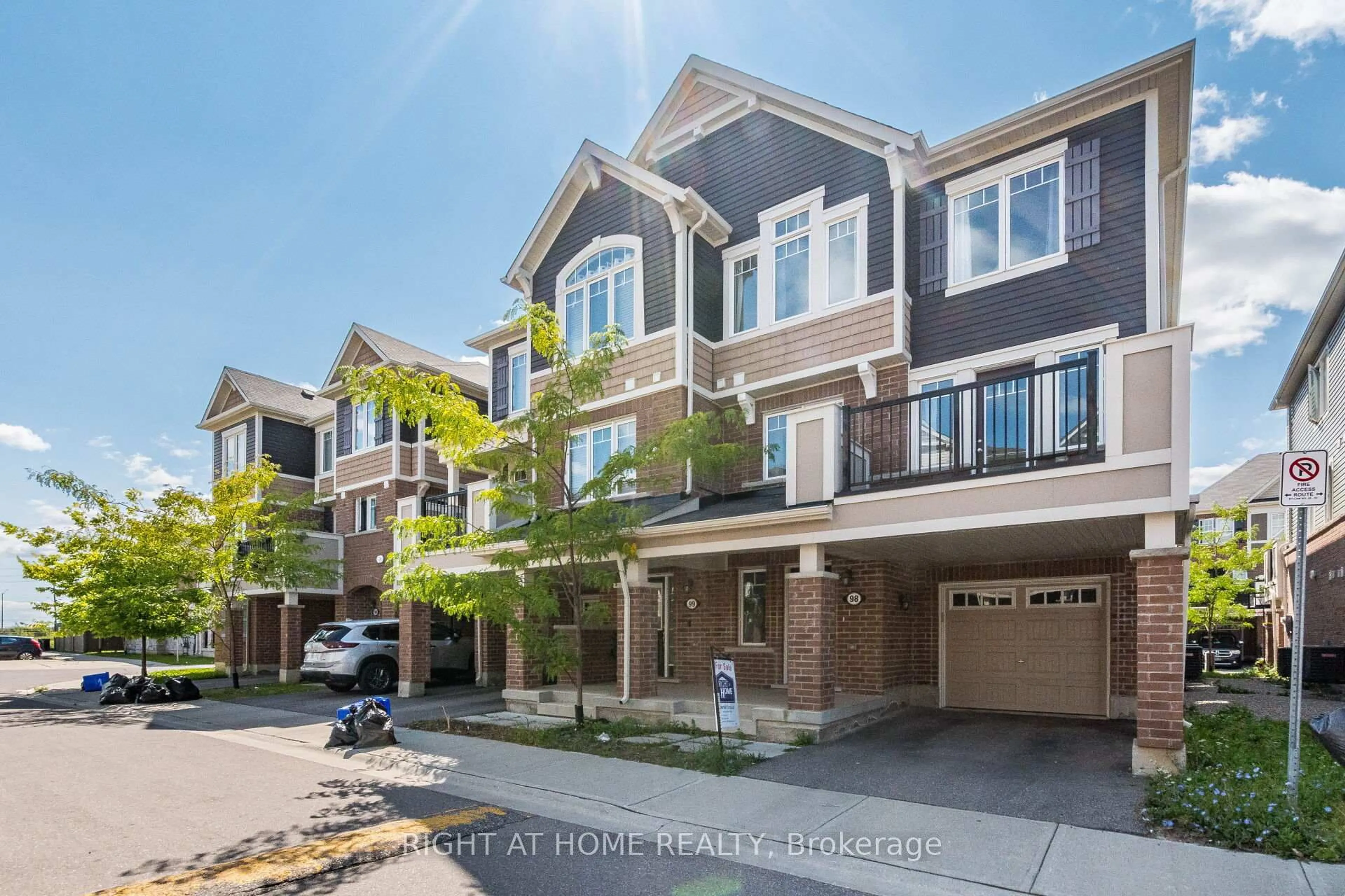 A pic from outside/outdoor area/front of a property/back of a property/a pic from drone, street for 1000 Asleton Blvd #98, Milton Ontario L9T 9L4