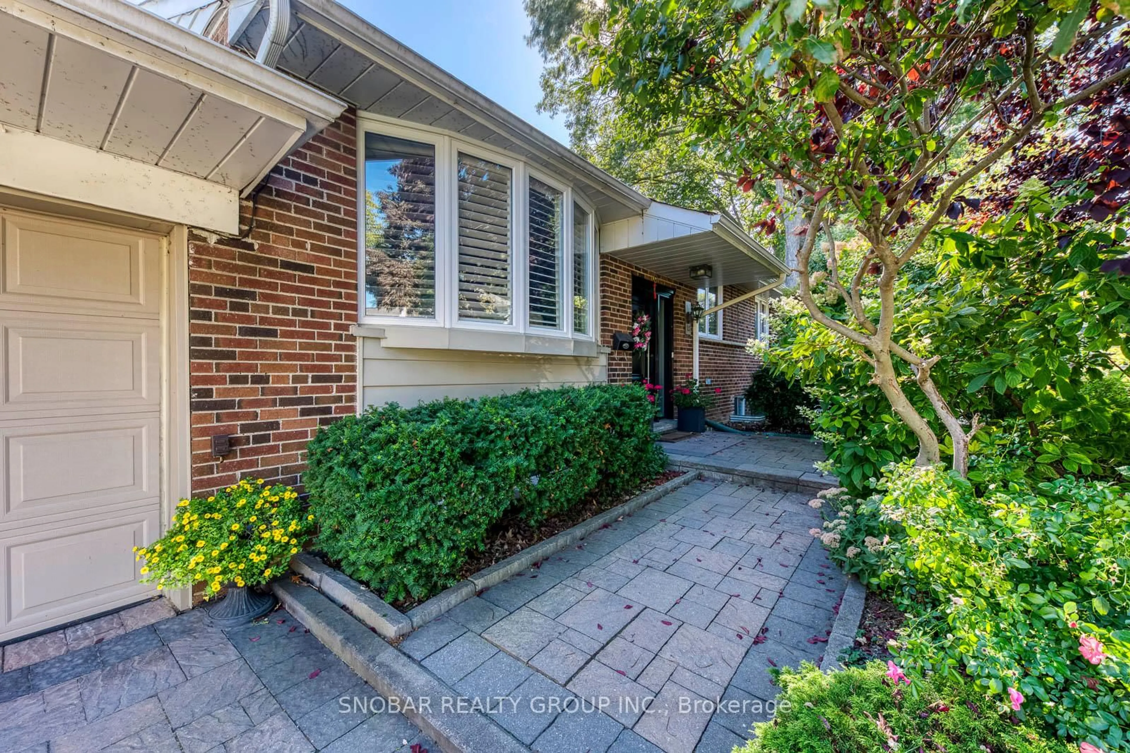 Home with brick exterior material, street for 16 Cheshire Dr, Toronto Ontario M9B 2N8