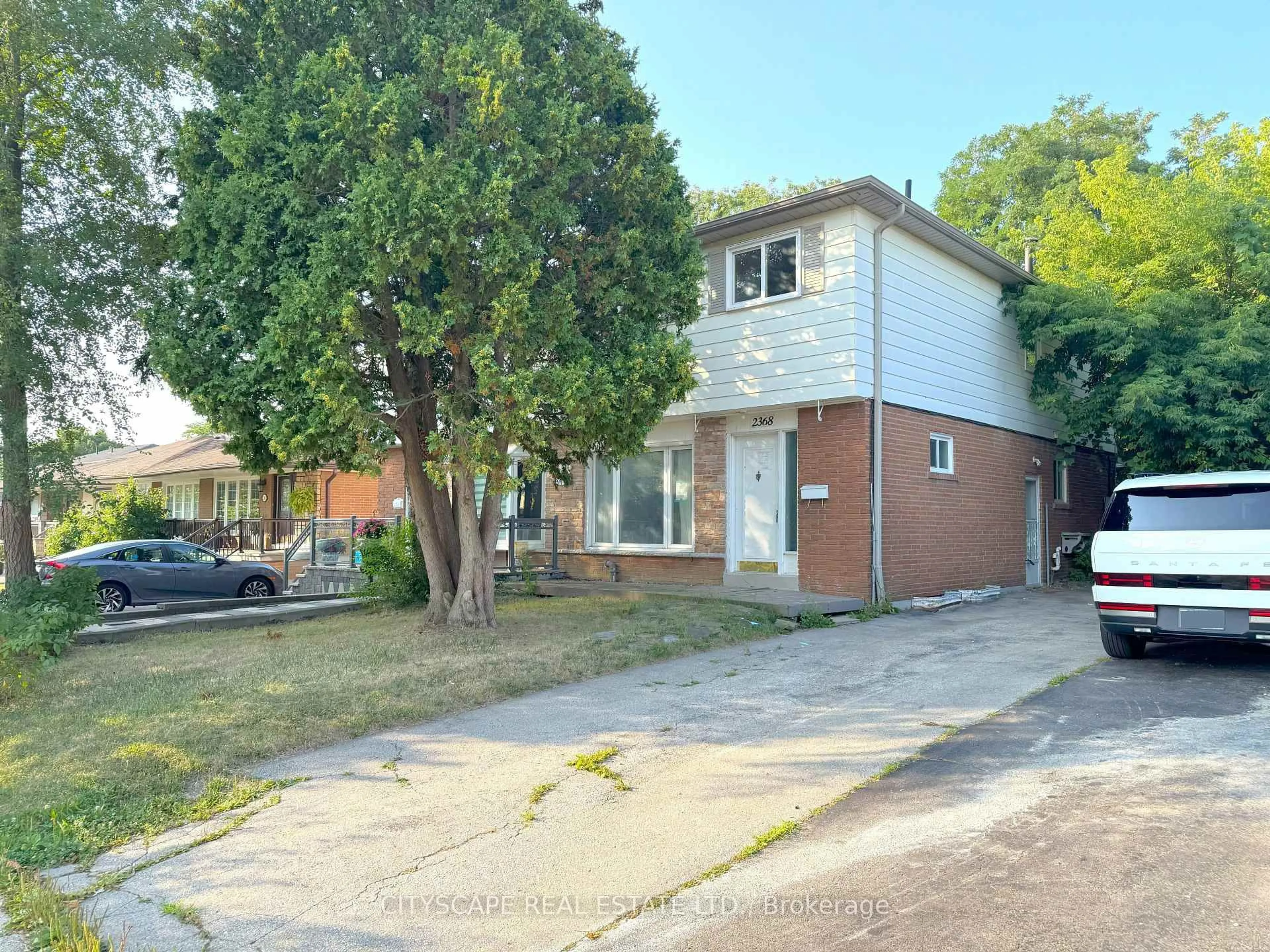 Home with brick exterior material, street for 2368 Gareth Rd, Mississauga Ontario L5B 1Z5
